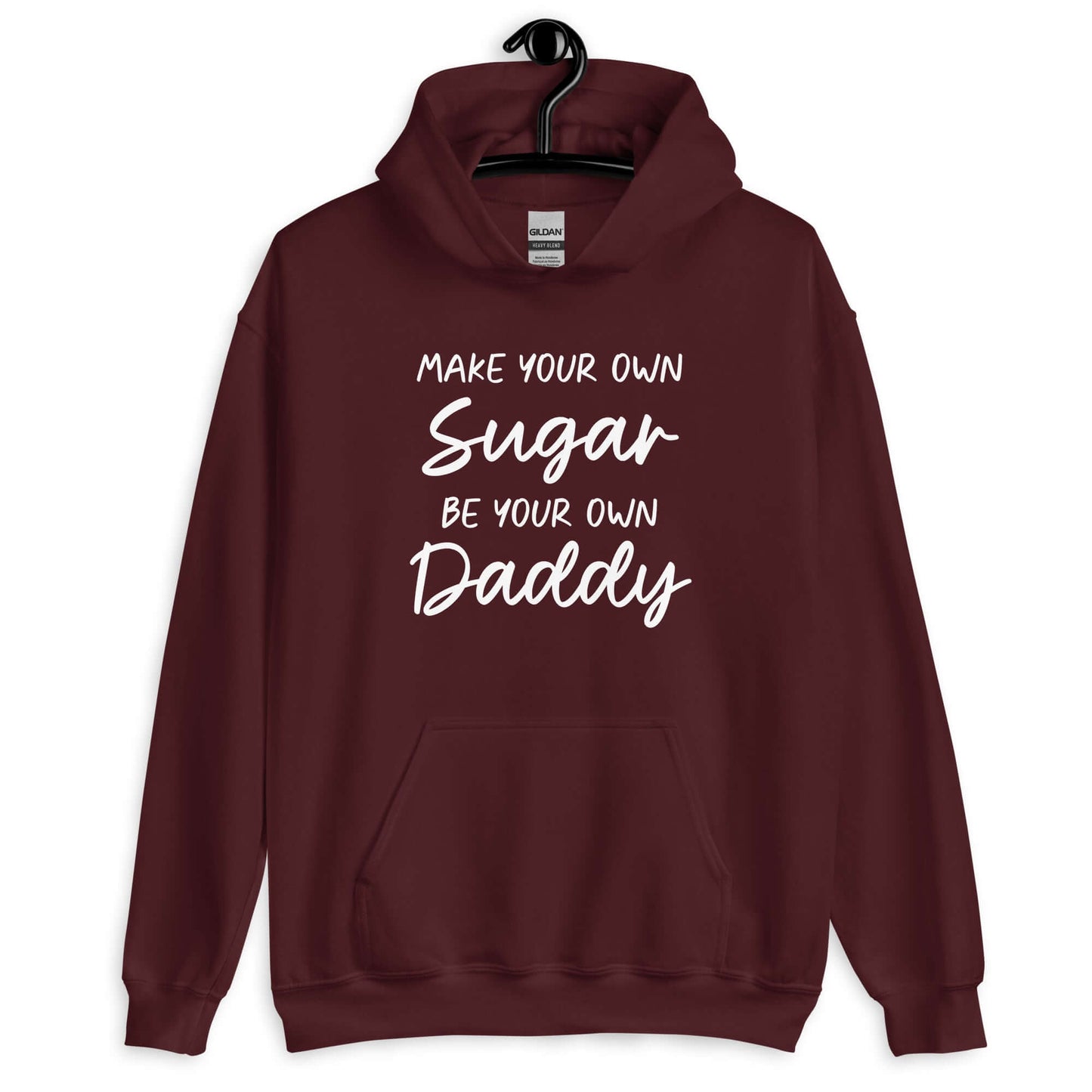 Maroon hoodie sweatshirt with the phrase Make your own sugar Be your own Daddy printed on the front.