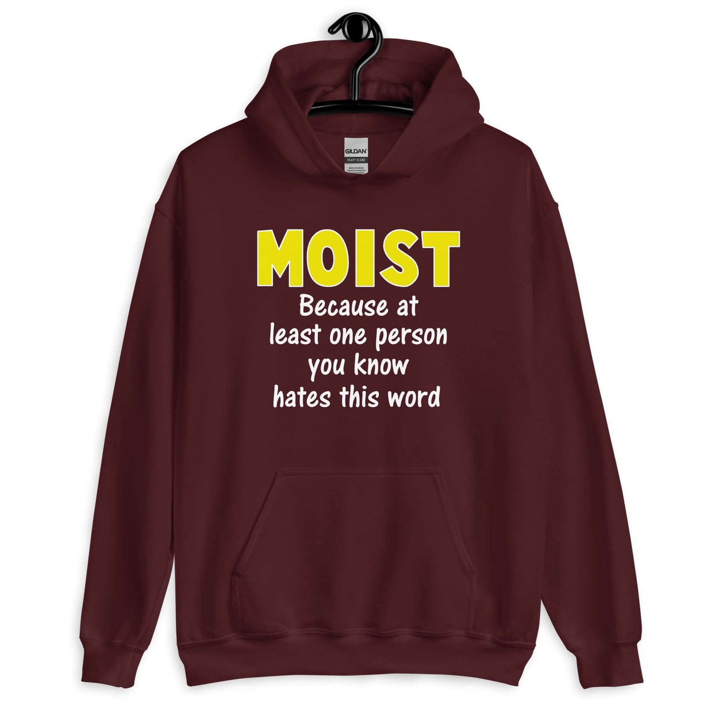 Maroon hoodie sweatshirt with the word Moist printed in large yellow bold font. In smaller font under the word moist is the phrase Because at least one person you know hates this word.