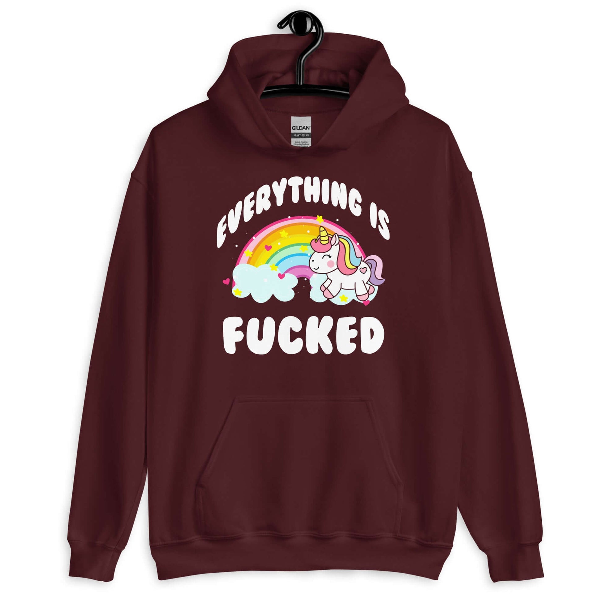 Maroon hoodie sweatshirt with a graphic of a kawaii style unicorn and a pastel rainbow with the words Everything is fucked printed on the front.