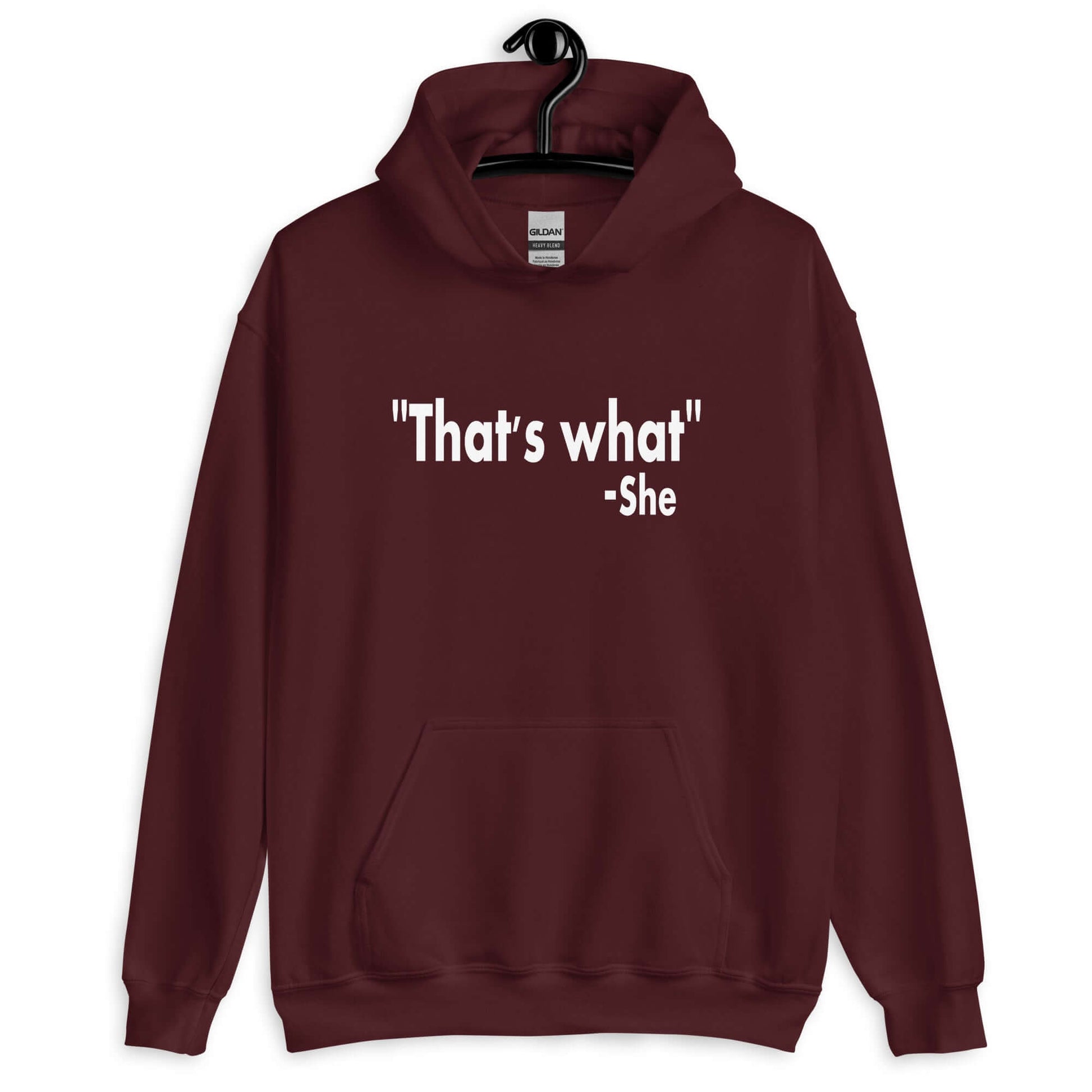 Maroon hoodie sweatshirt with the funny quote That's what-she printed on the front.