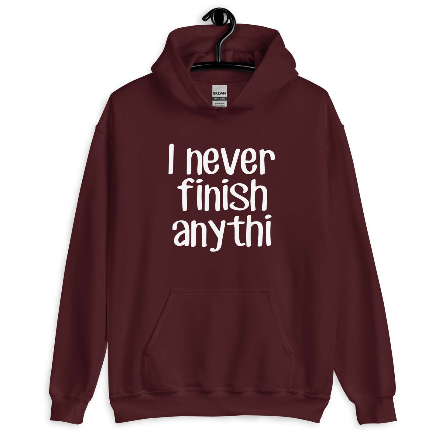 Maroon hoodie sweatshirt with the phrase I never finish anything printed on the front The letters n and g are missing from the word anything.