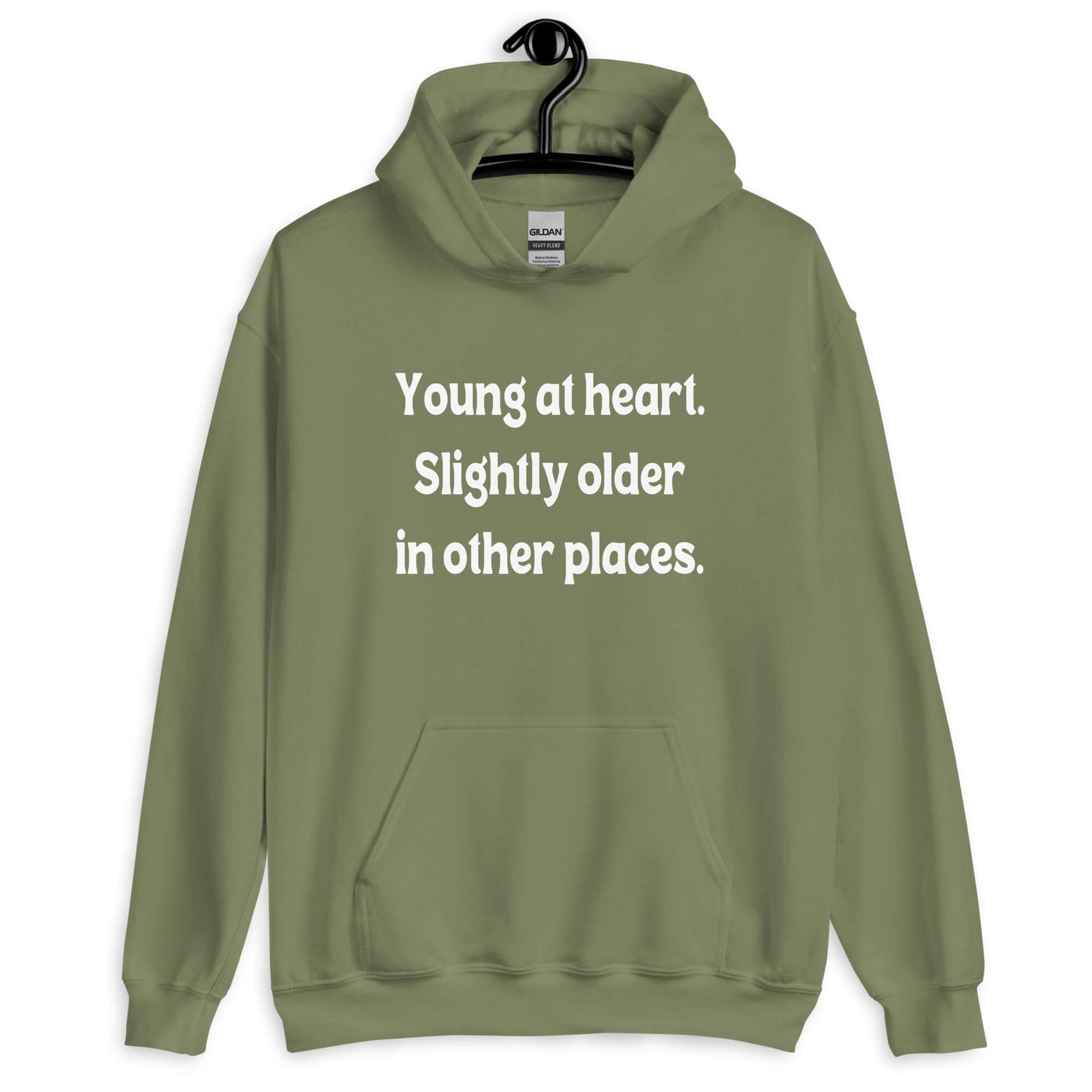 Military green hoodie sweatshirt with the words Young at heart, slightly older in other places printed on the front.