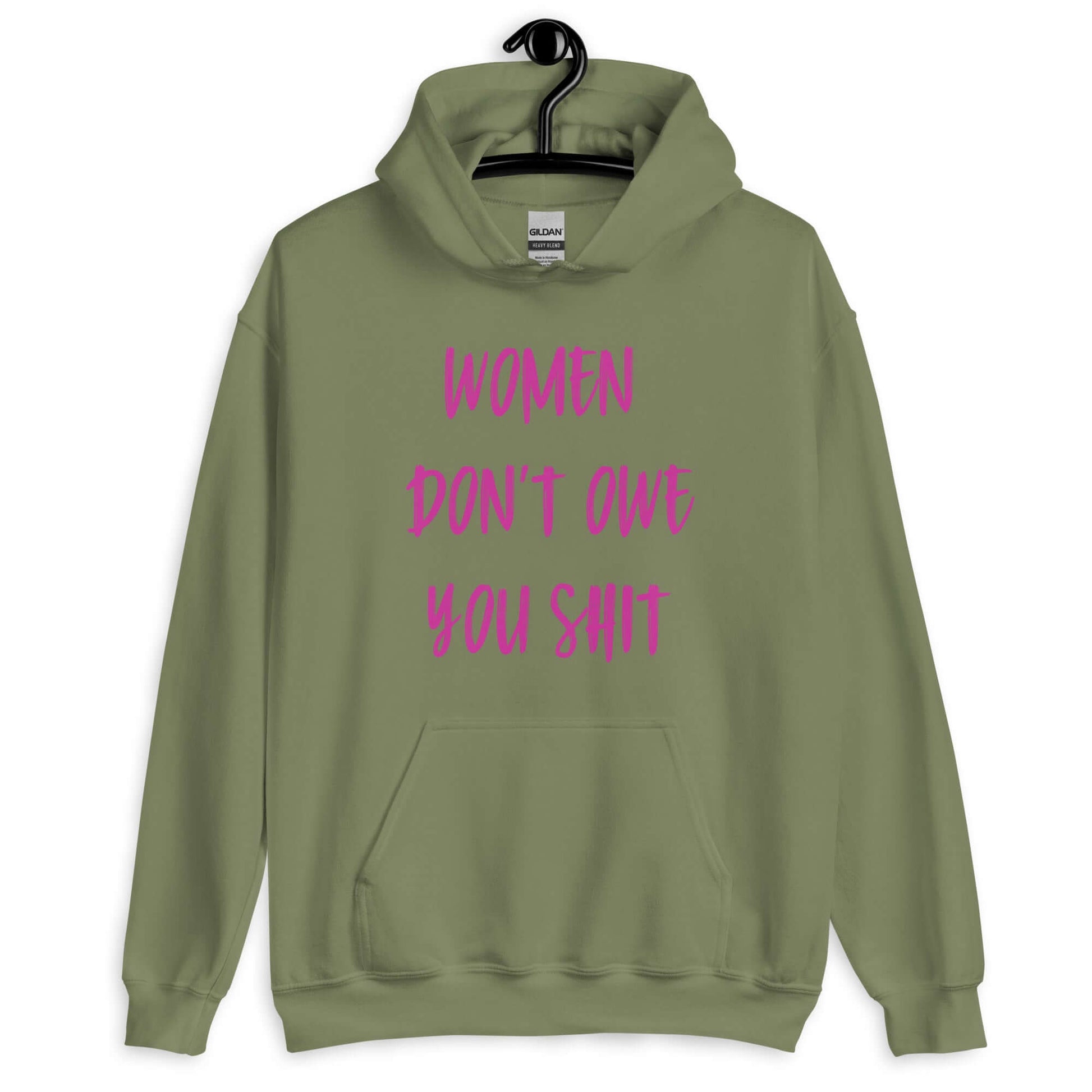 Military green hoodie sweatshirt with the words Women don't owe you shit printed on the front in pink.