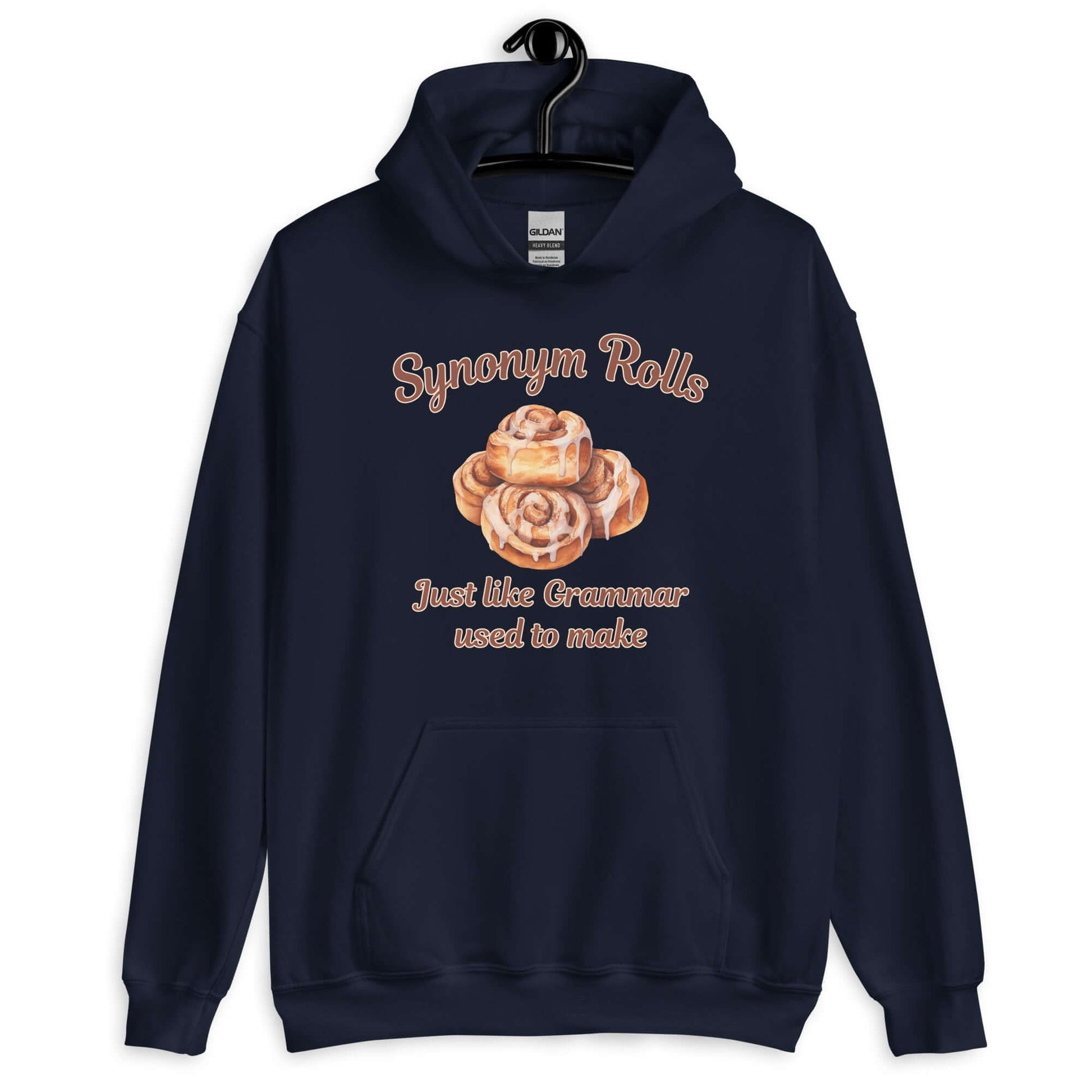 Navy blue hoodie sweatshirt with an image of cinnamon rolls and the pun phrase Synonym rolls Just like Grammar used to make printed on the front.