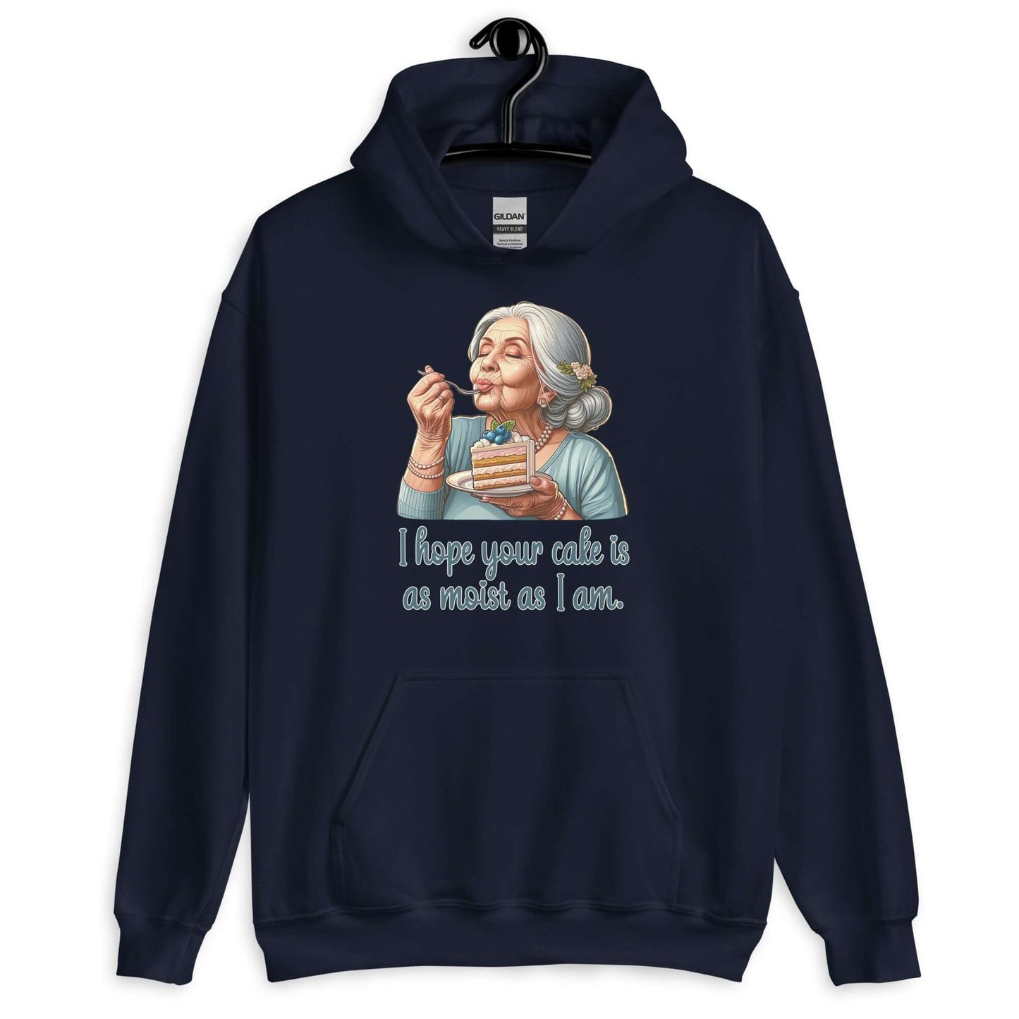 Navy blue hoodie with image of grey haired older woman enjoying a bite of a piece of cake with the words I hope your cake is as moist as I am printed on the front.