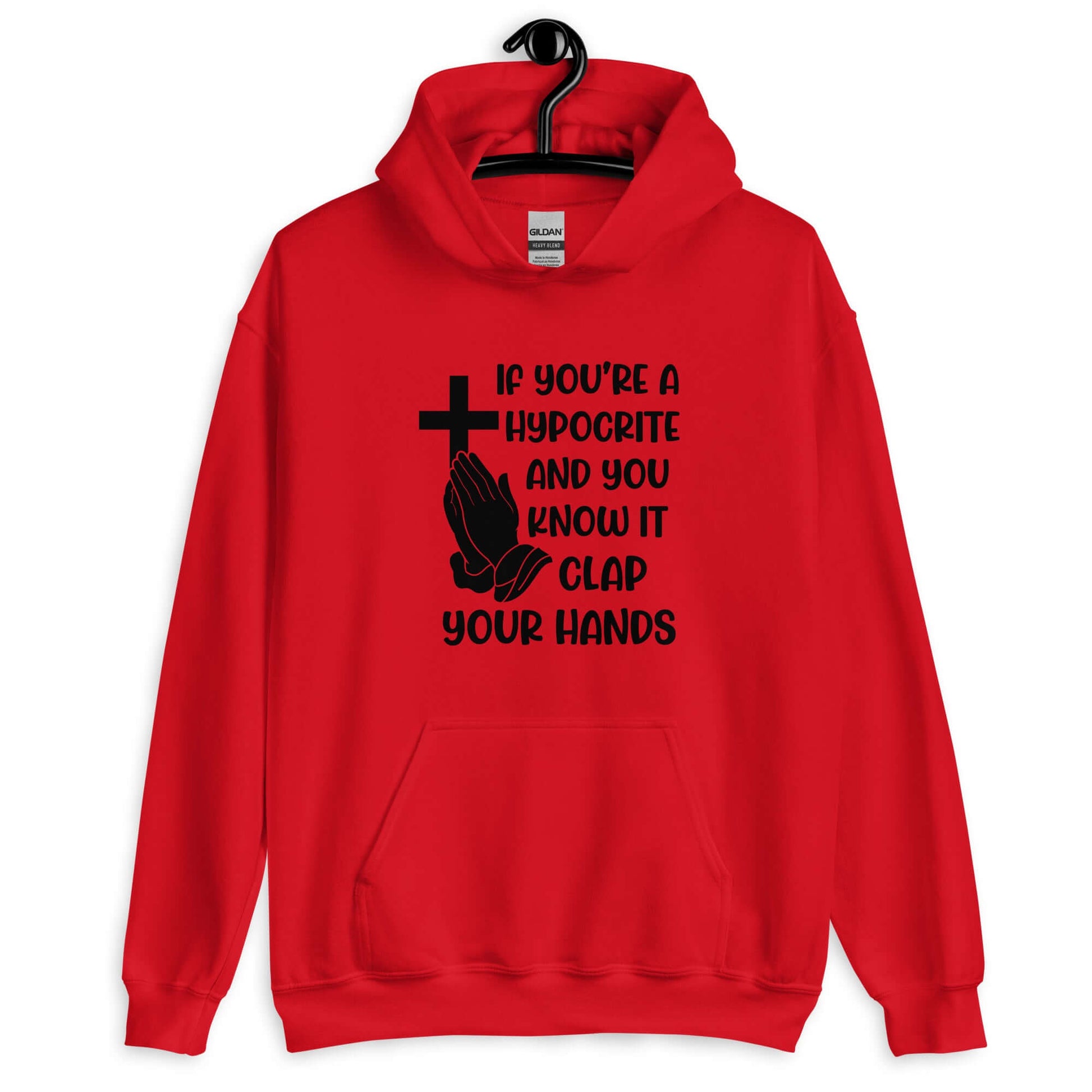 Red hoodie sweatshirt with image of a cross and praying hands & the phrase If you're a hypocrite and you know it clap your hands printed on the front.