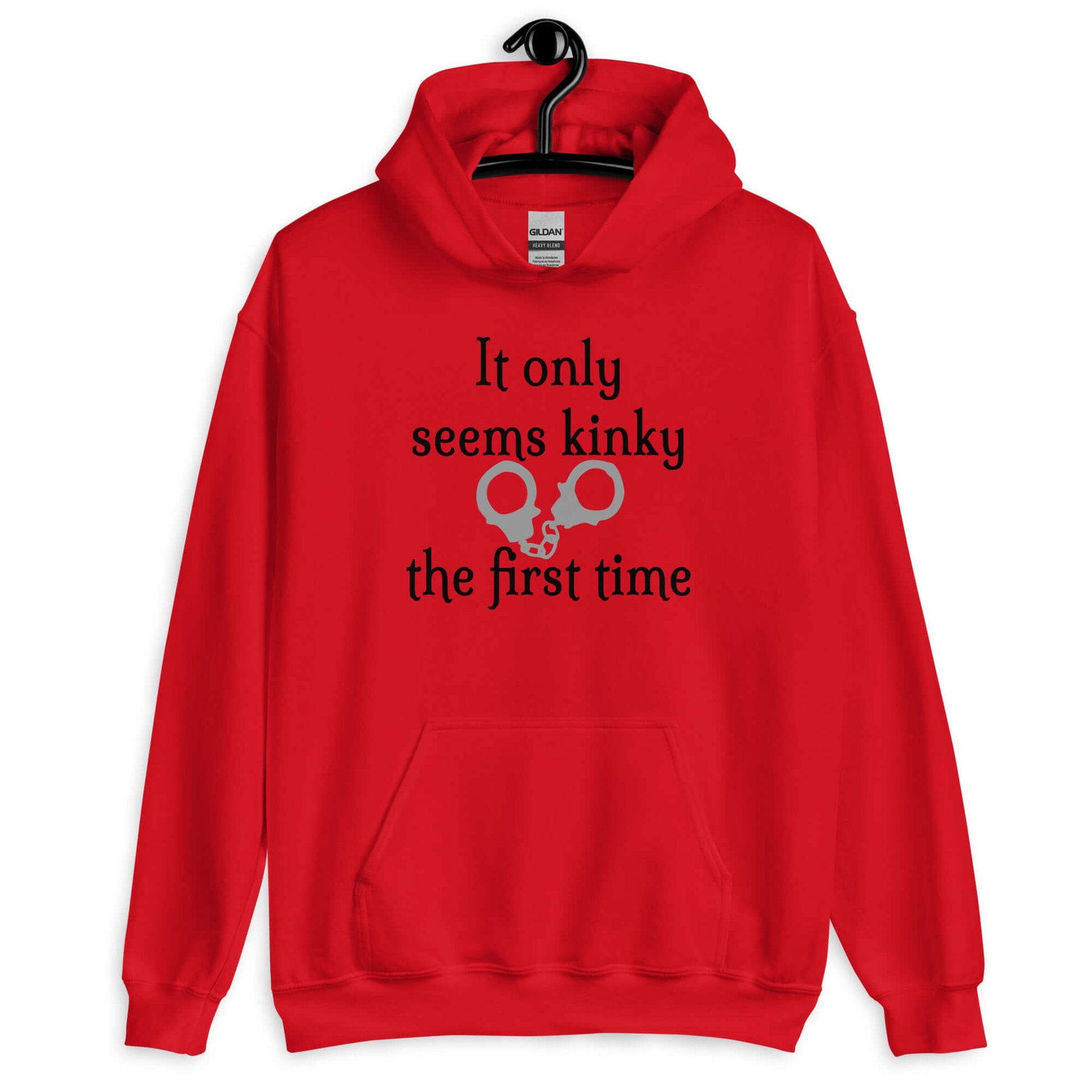 Red hoodie sweatshirt with the phrase It only seems kinky the first time printed on the front. There is an image of handcuffs with the text.