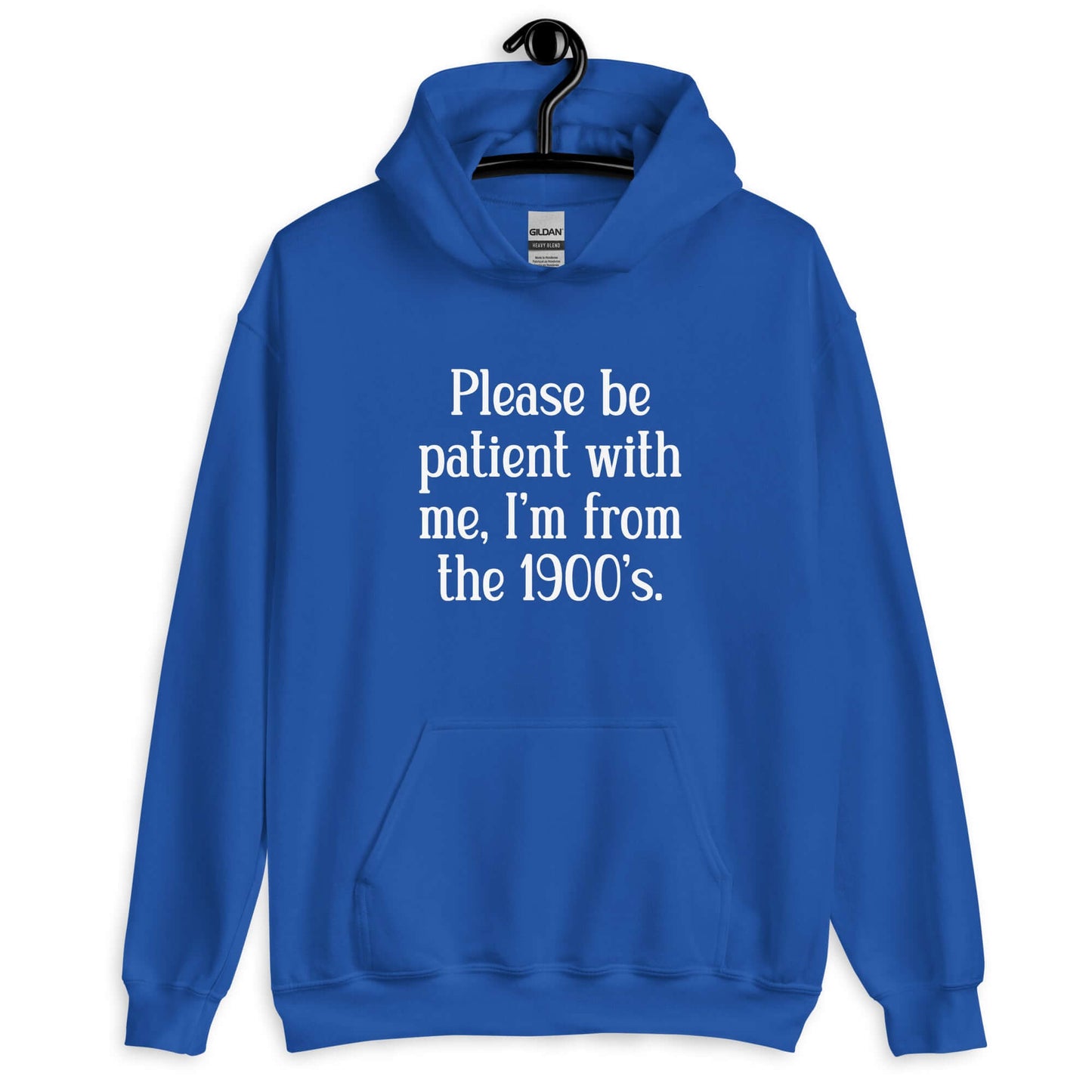 Royal blue hoodie sweatshirt with the phrase Please be patient with me, I'm from the 1900s printed on the front.