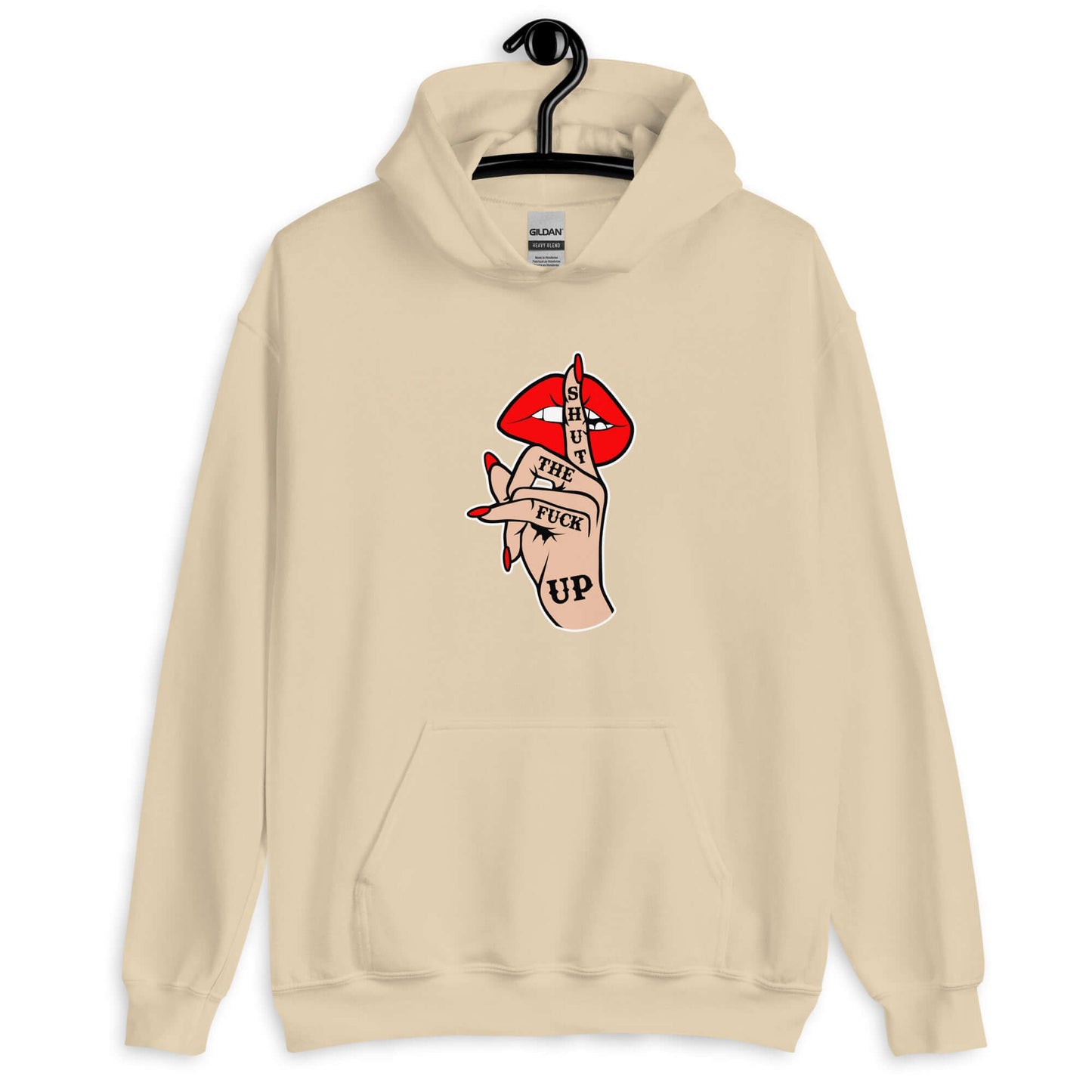 Sand color hoodie sweatshirt with an image of a hand over lips making the shh gesture. The words Shut the fuck up are printed on the hand. The graphics are printed on the front of the hoodie.