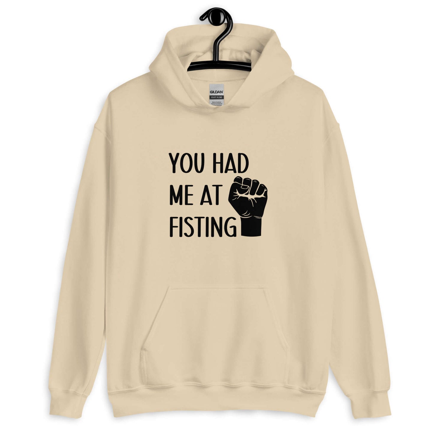 Sand hooded sweatshirt with image of a fist and the words You had me at fisting printed on the front.