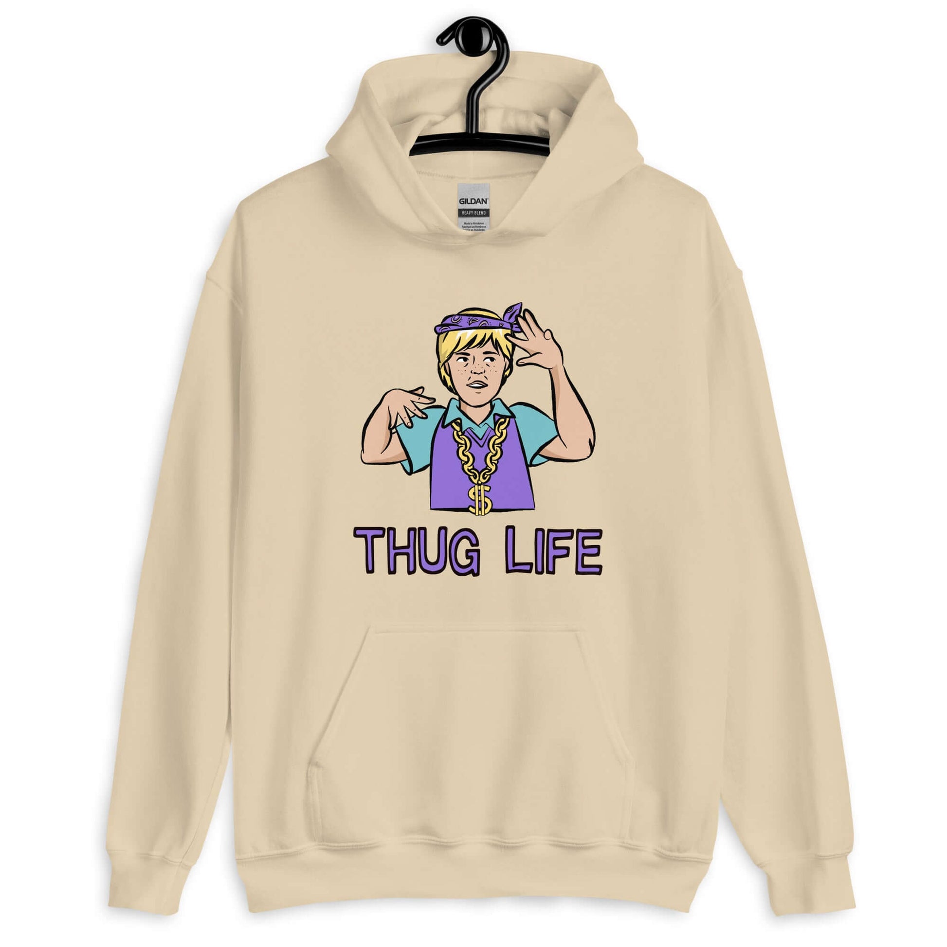 Sand color hoodie sweatshirt with a parody image of a blond haired child trying to be a gangster with the words Thug Life printed on the front.