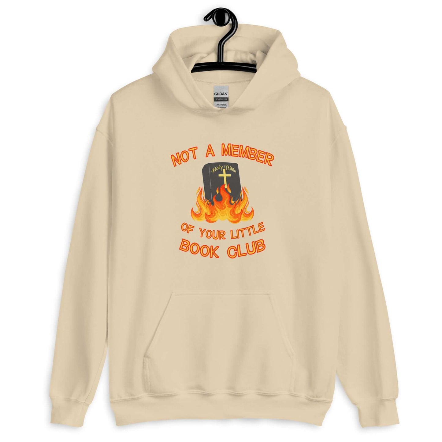 Sand color hoodie sweatshirt with image of a burning bible and the words Not a member of your little book club printed on the front.