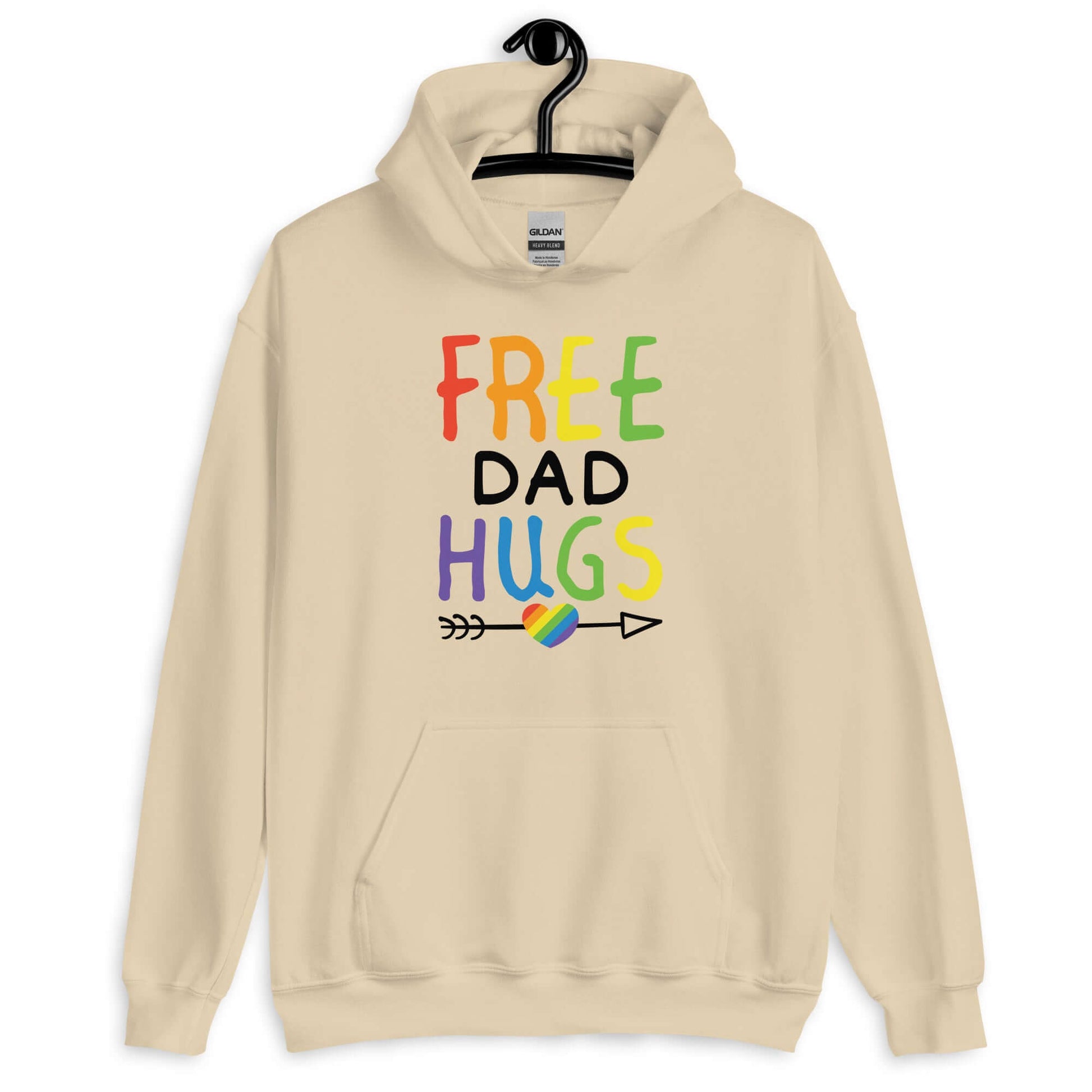 Sand color hoodie sweatshirt with the words Free Dad hugs printed on the front in rainbow letters.