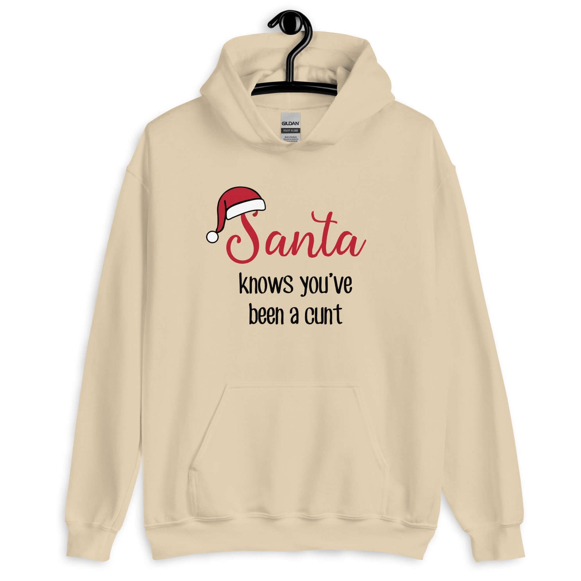 Sand color hoodie sweatshirt with the words Santa knows you've been a cunt printed on the front. There is a Santa hat on the s in Santa.