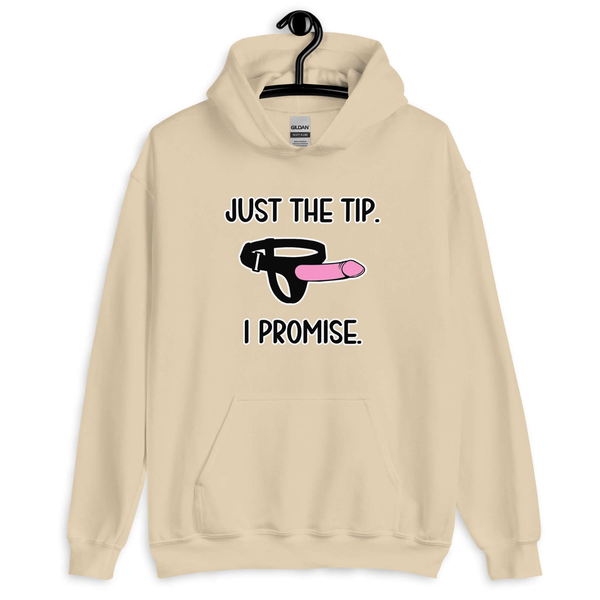 Sand color hoodie sweatshirt that has an image of a strap-on dildo and the words Just the tip, I promise printed on the front. The graphics are pink, black and white.