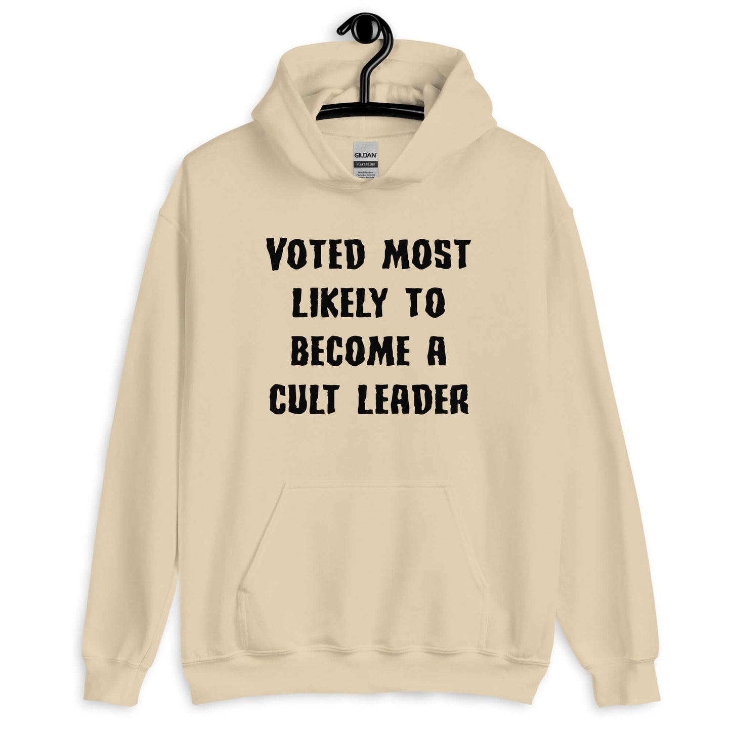 Sand hoodie sweatshirt with the phrase Voted most likely to become a cult leader printed on the front.