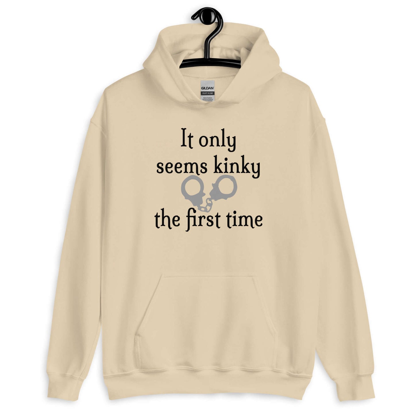 Sand hoodie sweatshirt with the phrase It only seems kinky the first time printed on the front. There is an image of handcuffs with the text.