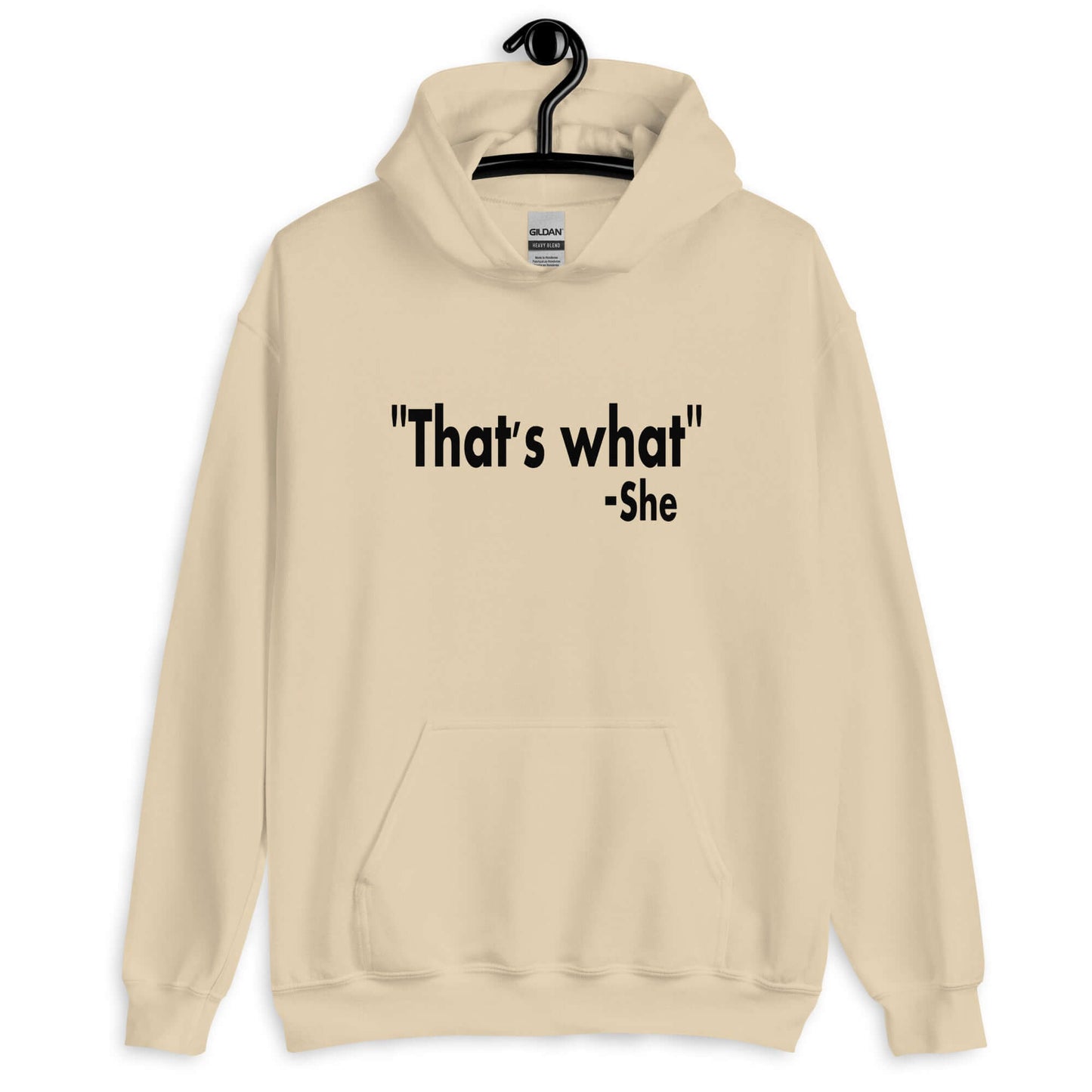 Sand color hoodie sweatshirt with the funny quote That's what-she printed on the front.