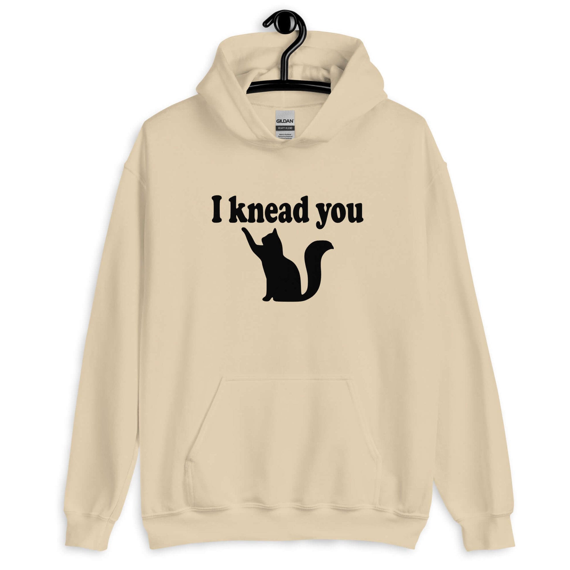 Sand hoodie sweatshirt that has an image of a silhouette of a cat and the words I knead you printed on the front.