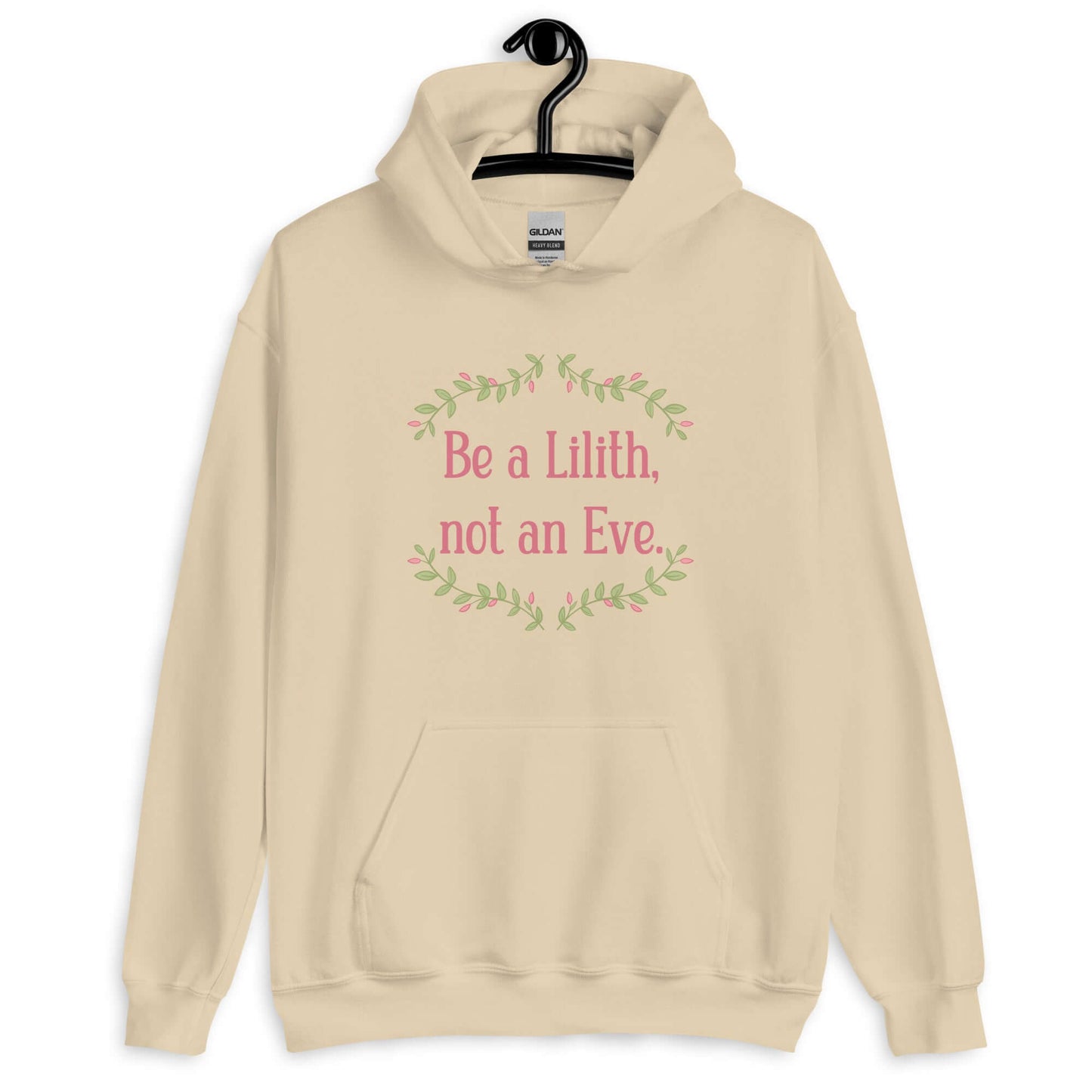 Sand color hoodie sweatshirt with the phrase Be a Lilith, not an Eve printed on the front. The text is pink and had a green floral vine graphic framing the text.