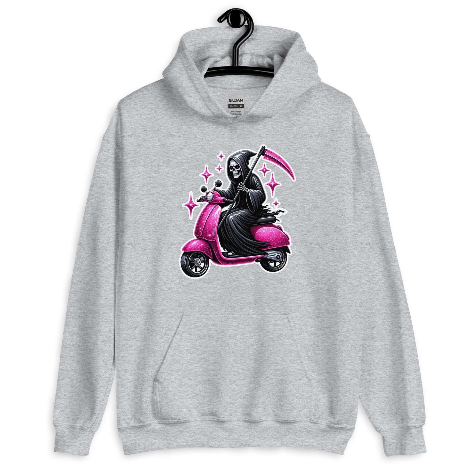 Light grey hoodie sweatshirt with funny image of the Grim Reaper riding on a glam pink scooter printed on the front.