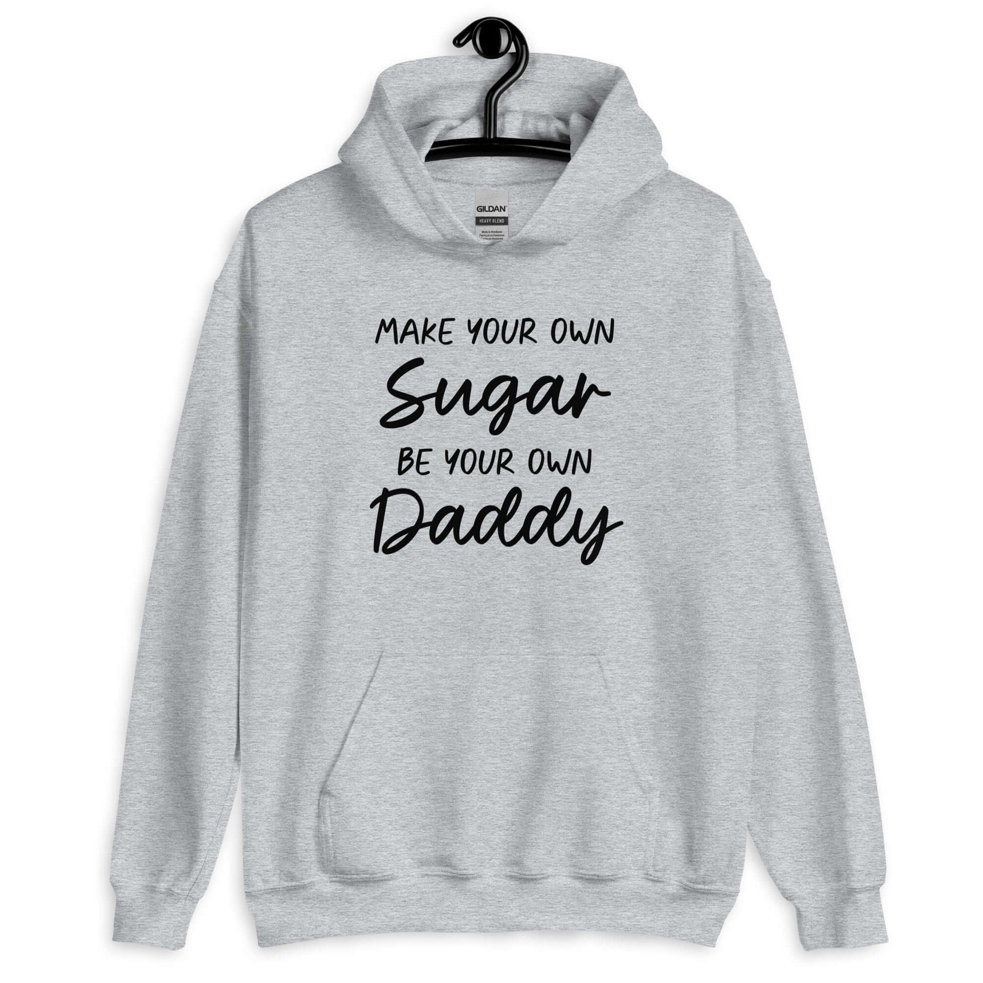 Light sport grey hoodie sweatshirt with the phrase Make your own sugar Be your own Daddy printed on the front.