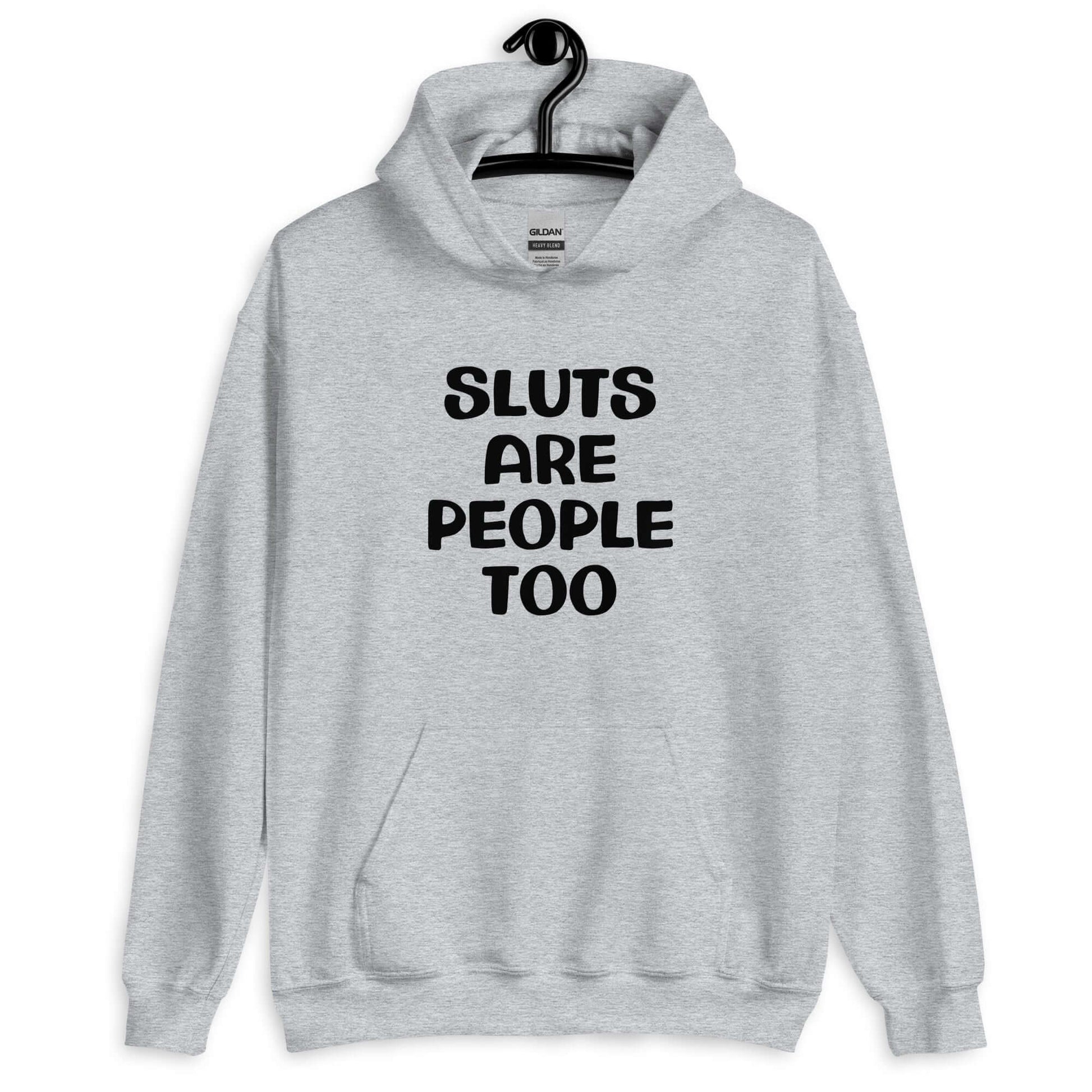 Sport grey hoodie sweatshirt with the phrase Sluts are people too printed on the front.