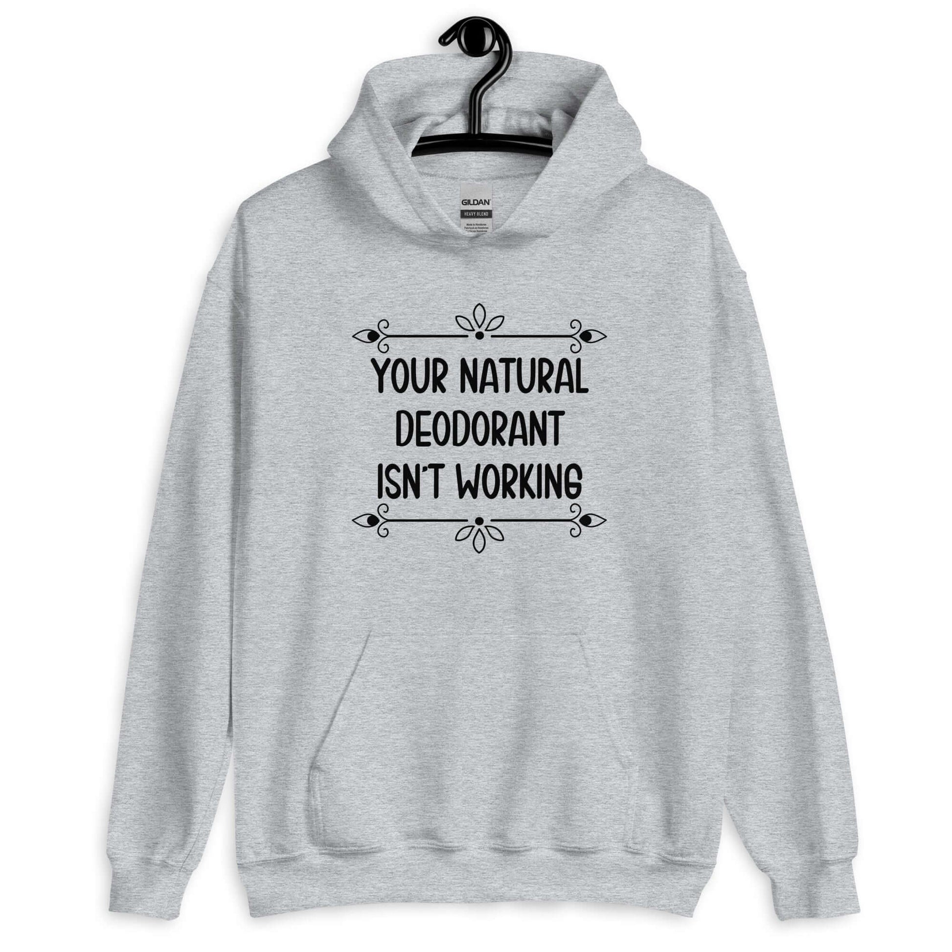 Sport grey hoodie sweatshirt with the funny phrase Your natural deodorant isnt working printed on the front.