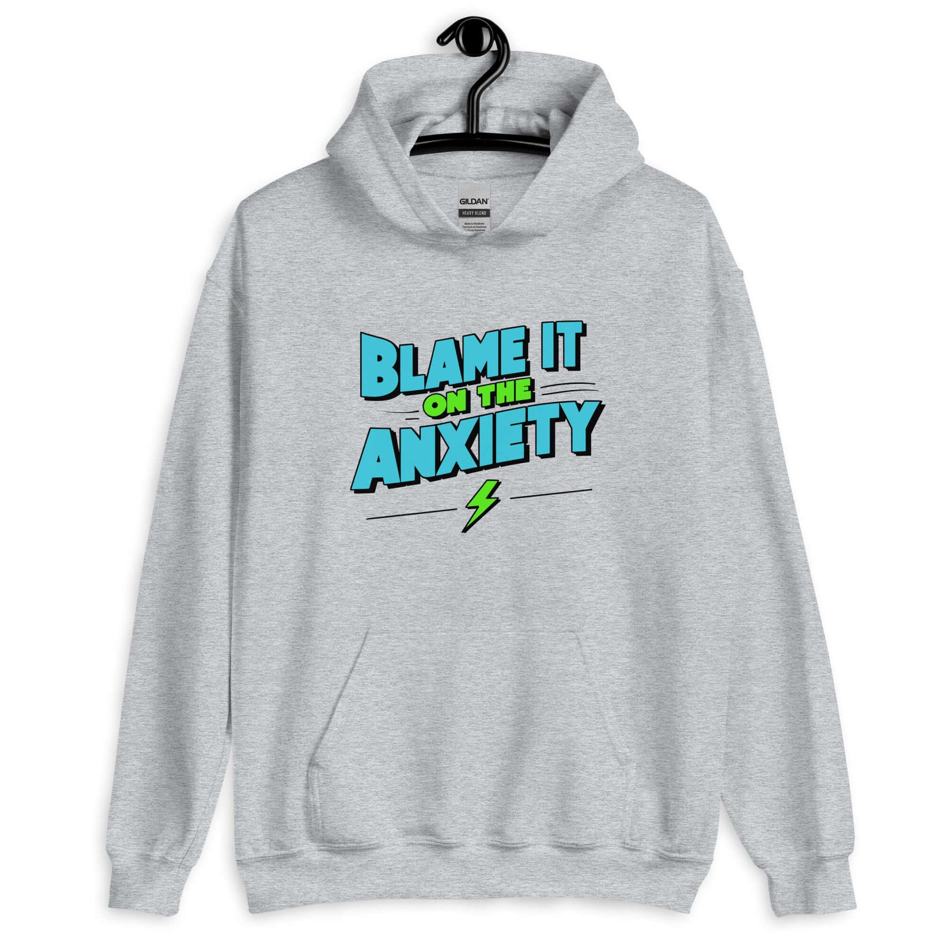 Sport grey hoodie sweatshirt with the phrase Blame is on the anxiety printed on the front. The graphics are bold and in aqua and lime green.