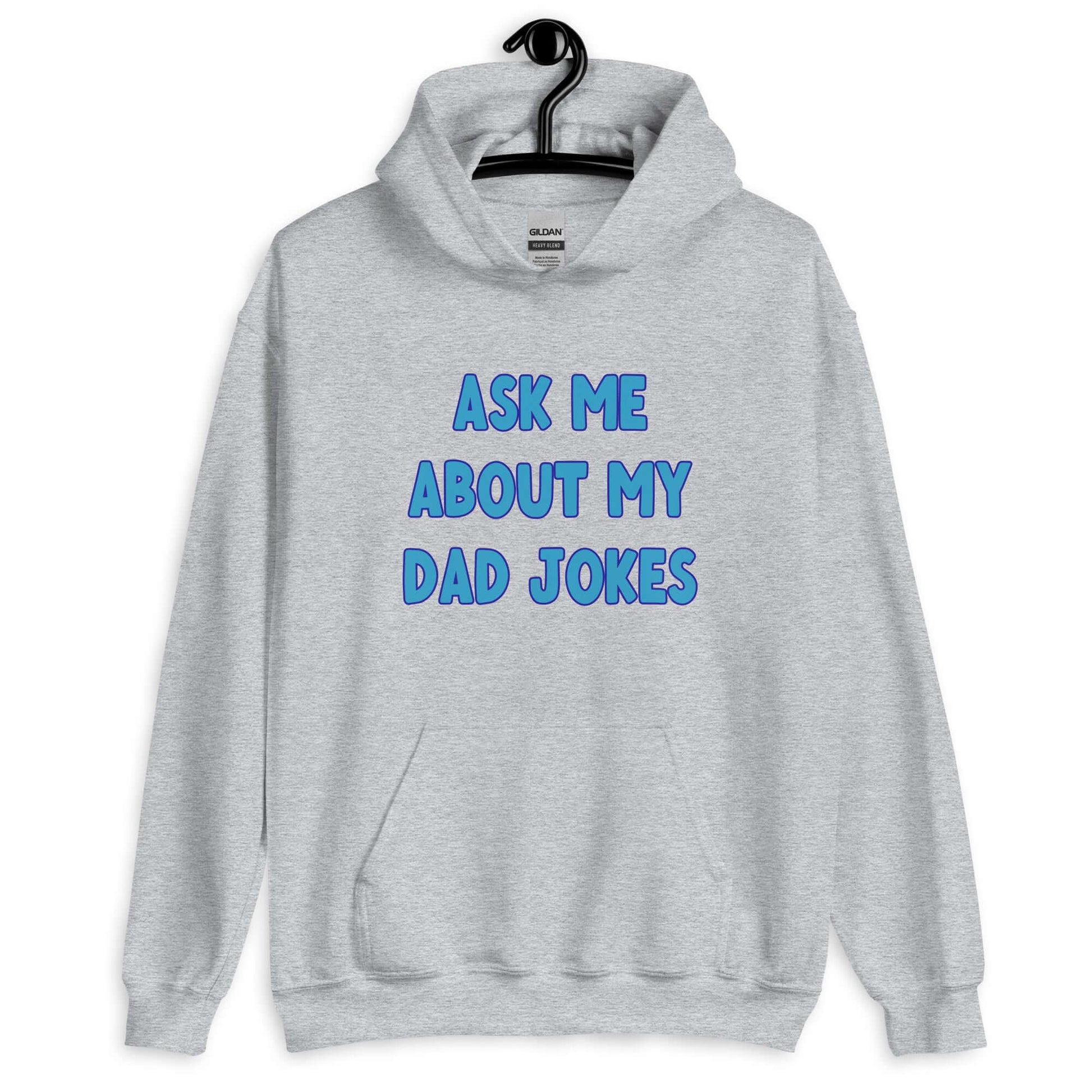 Sport grey hoodie sweatshirt with the words Ask me about my Dad jokes printed on the front.