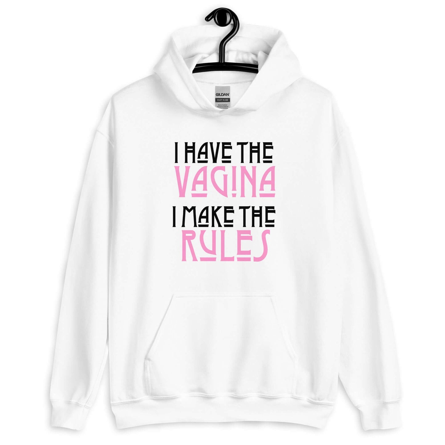 White hoodie sweatshirt with the words I have the vagina , I make the rules printed on the front. The words vagina and rules are pink, the rest of the words are black.