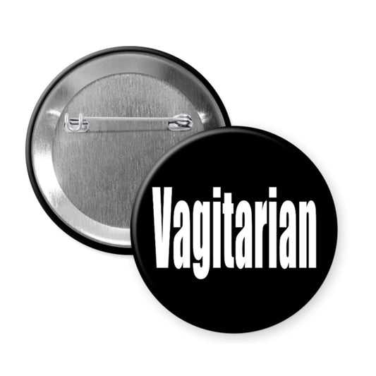 Black pinback button with the word Vagitarian printed on it.