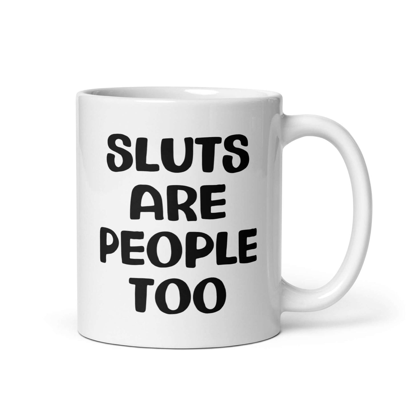 White ceramic mug with the phrase Sluts are people too printed on both sides.