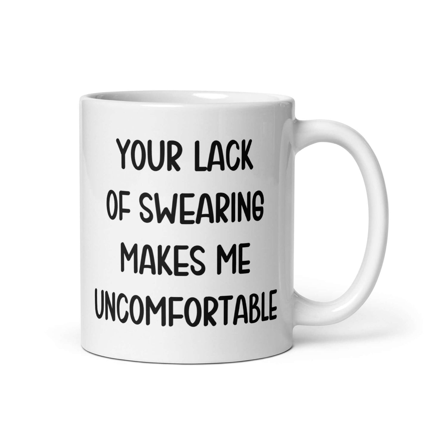 White ceramic mug with the phrase Your lack of swearing makes me uncomfortable printed on both sides.