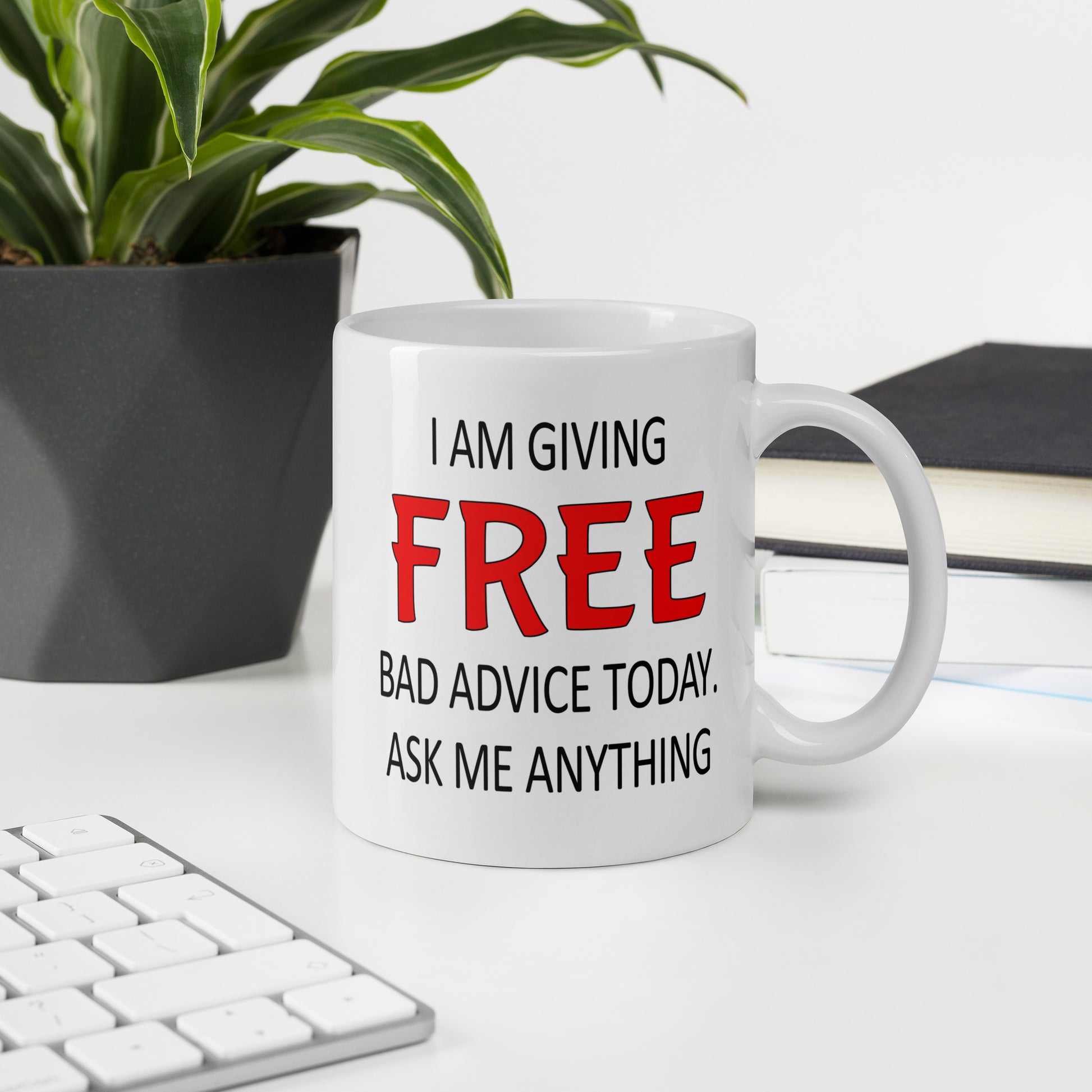 White ceramic coffee mug with the phrase I'm giving free bad advice today ask me anything printed on both sides of the mug.