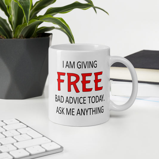 White ceramic coffee mug with the phrase I'm giving free bad advice today ask me anything printed on both sides of the mug.