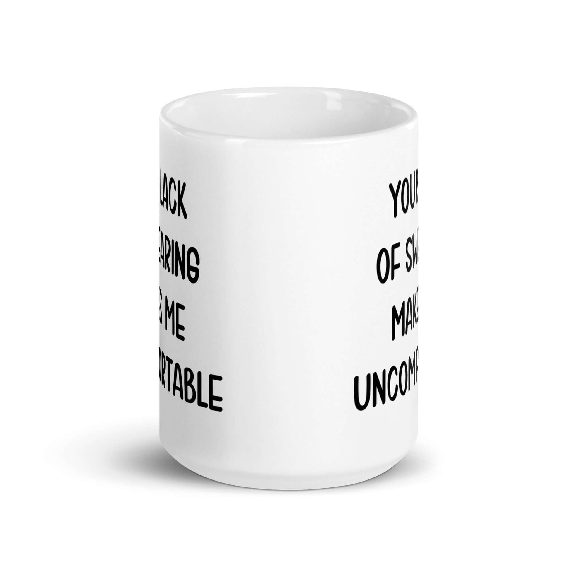 White ceramic mug with the phrase Your lack of swearing makes me uncomfortable printed on both sides.