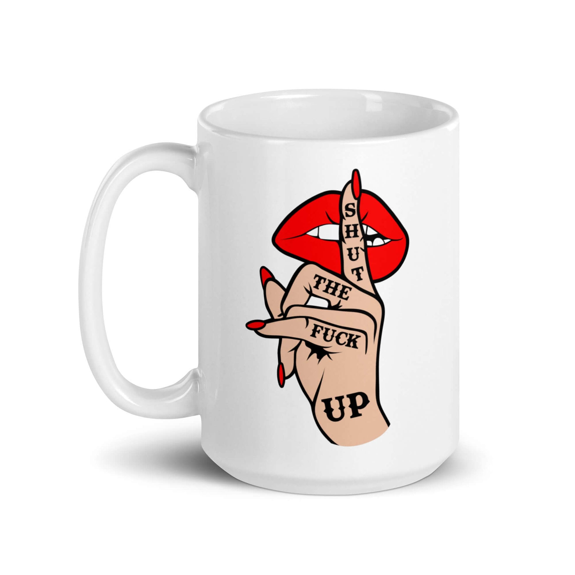 White ceramic mug with an image of a hand over lips making the shh gesture. The words Shut the fuck up are printed on the hand. The graphics are printed on both sides of the mug.