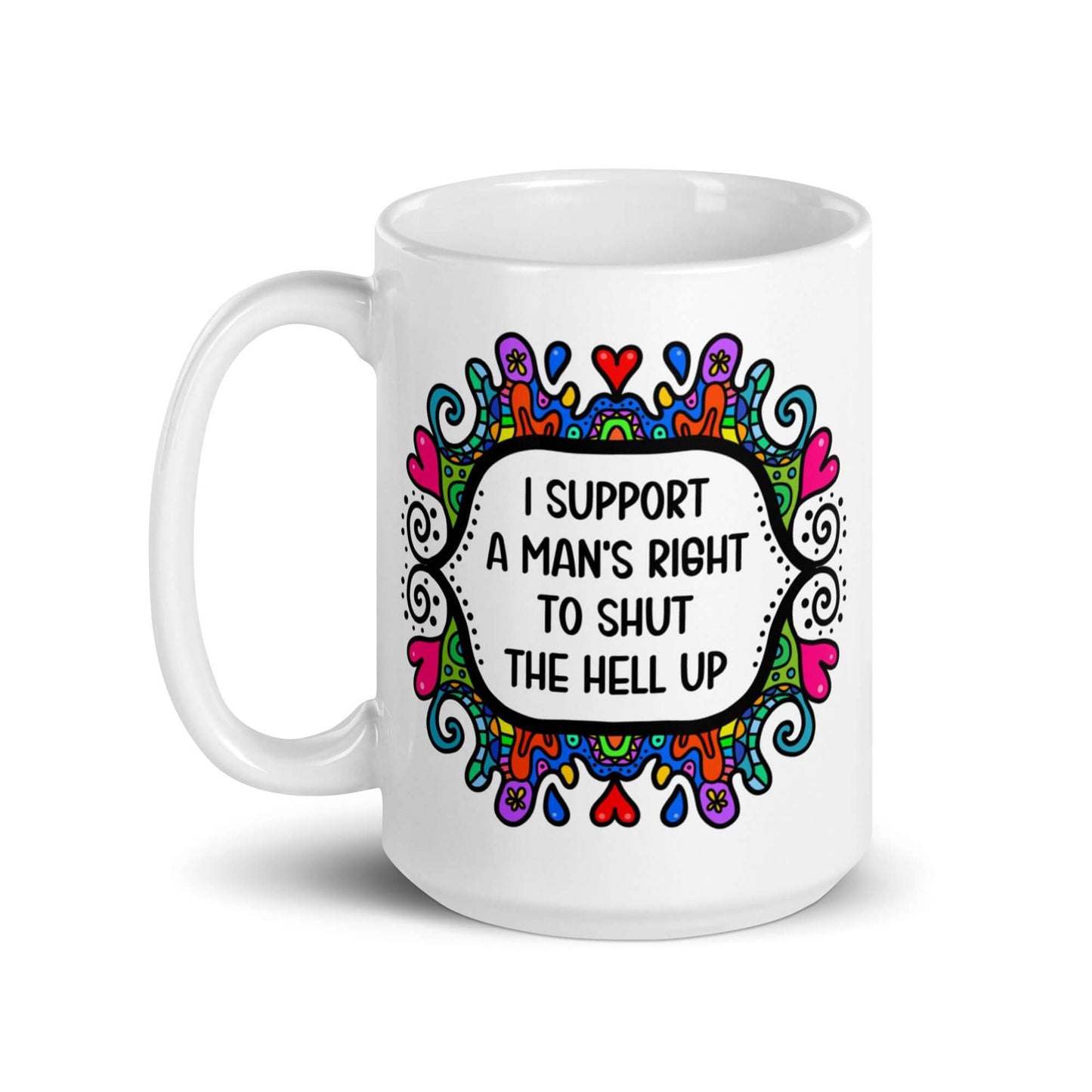 White ceramic mug with a colorful doodle graphic and the words I support a man's right to shut the hell up. The design is printed on both sides of the mug.