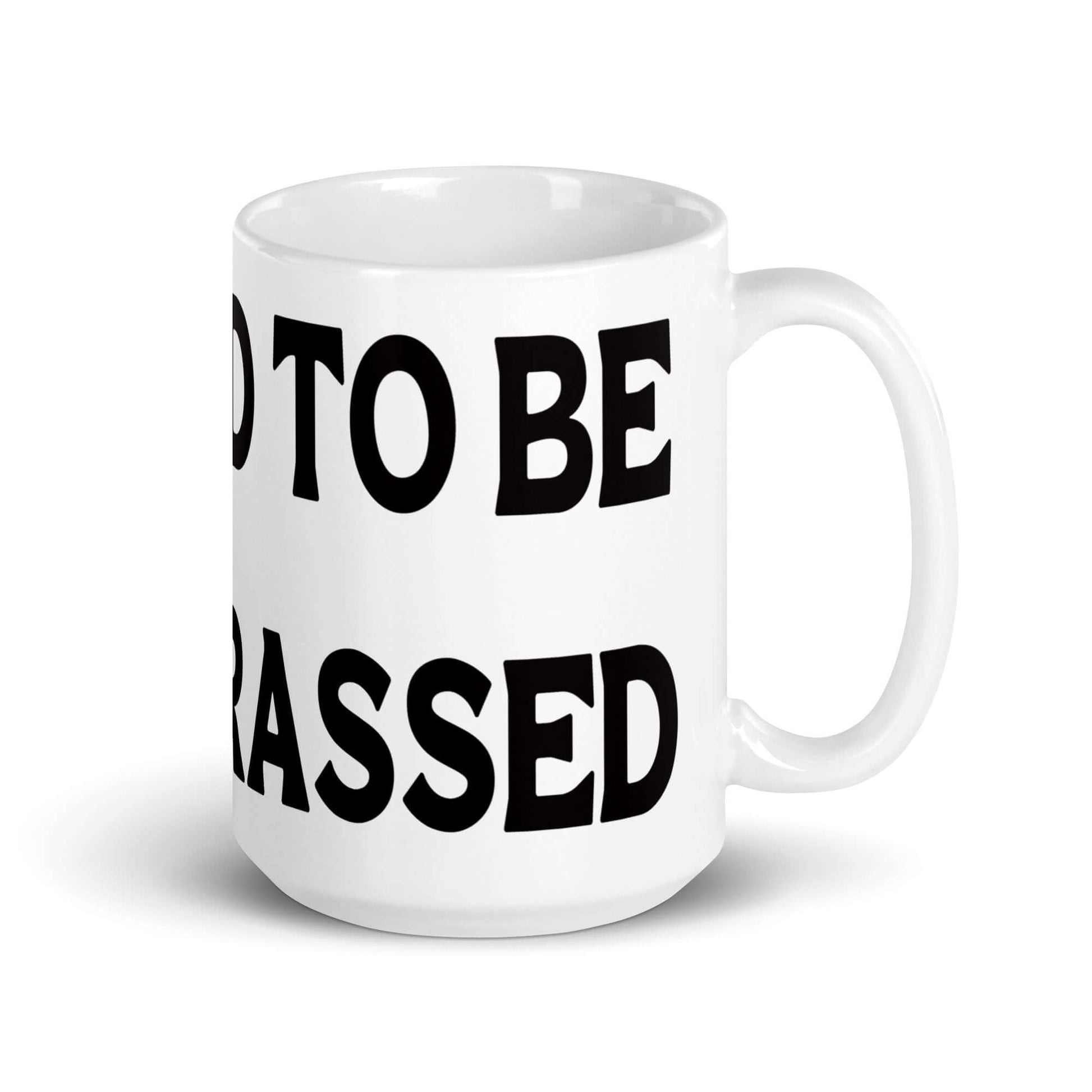 White ceramic mug with the words Too old to be embarrassed printed on it.