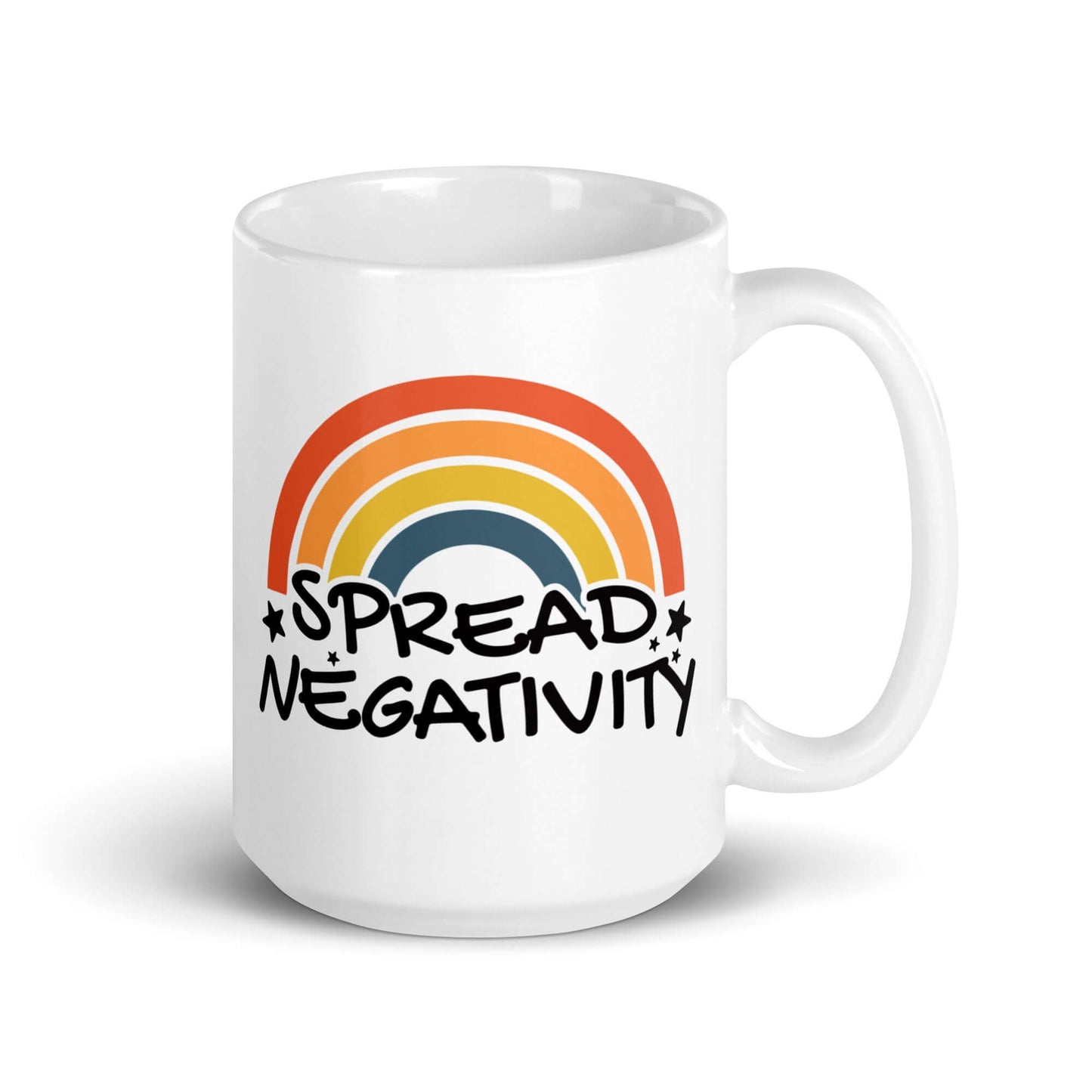 White ceramic mug with a graphic of a rainbow and the words Spread negativity printed on both sides.