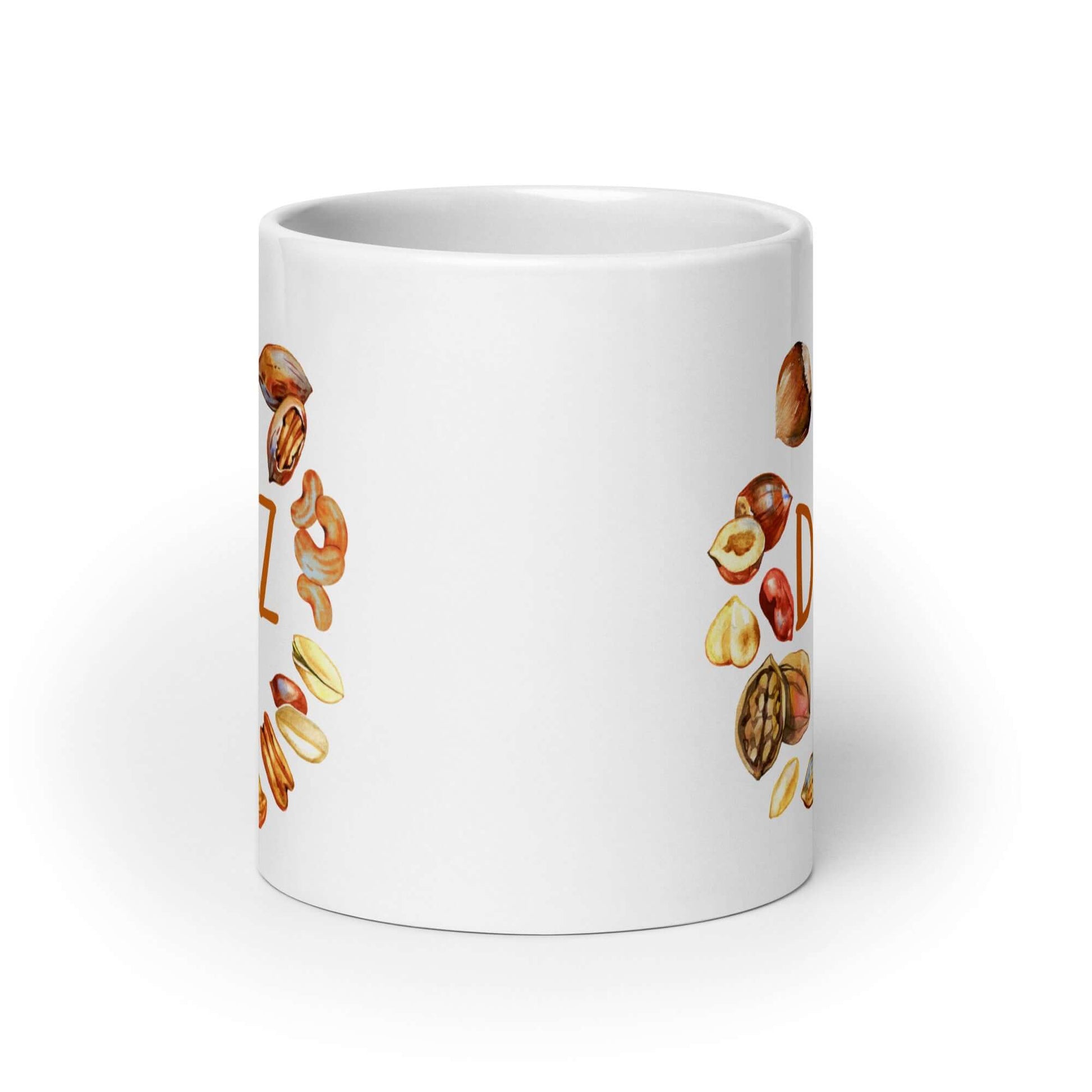 White ceramic mug with an image of various nuts and the word Deez. The graphic is printed on both sides of the mug.