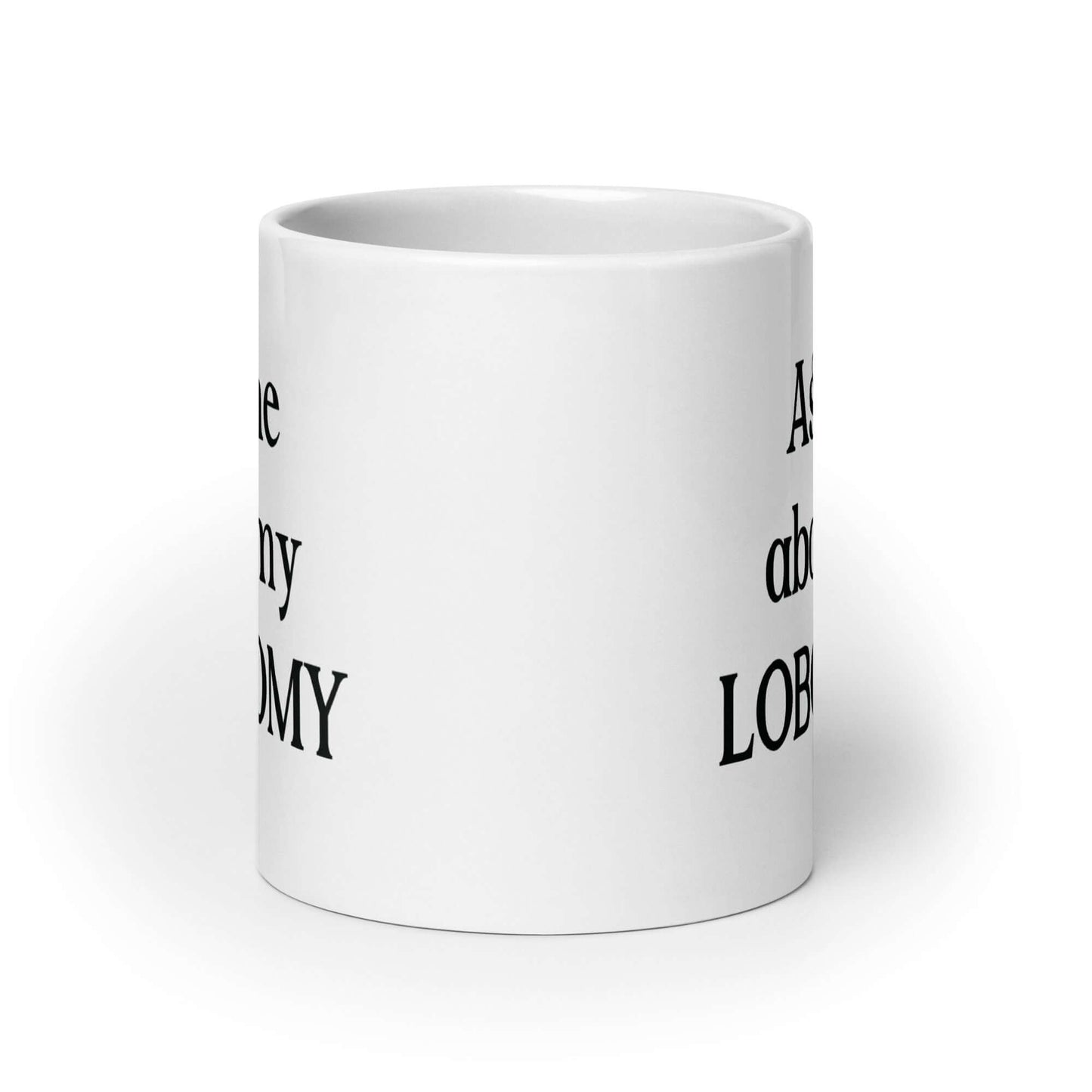 White ceramic mug with the phrase Ask me about my lobotomy printed on both sides of the mug.