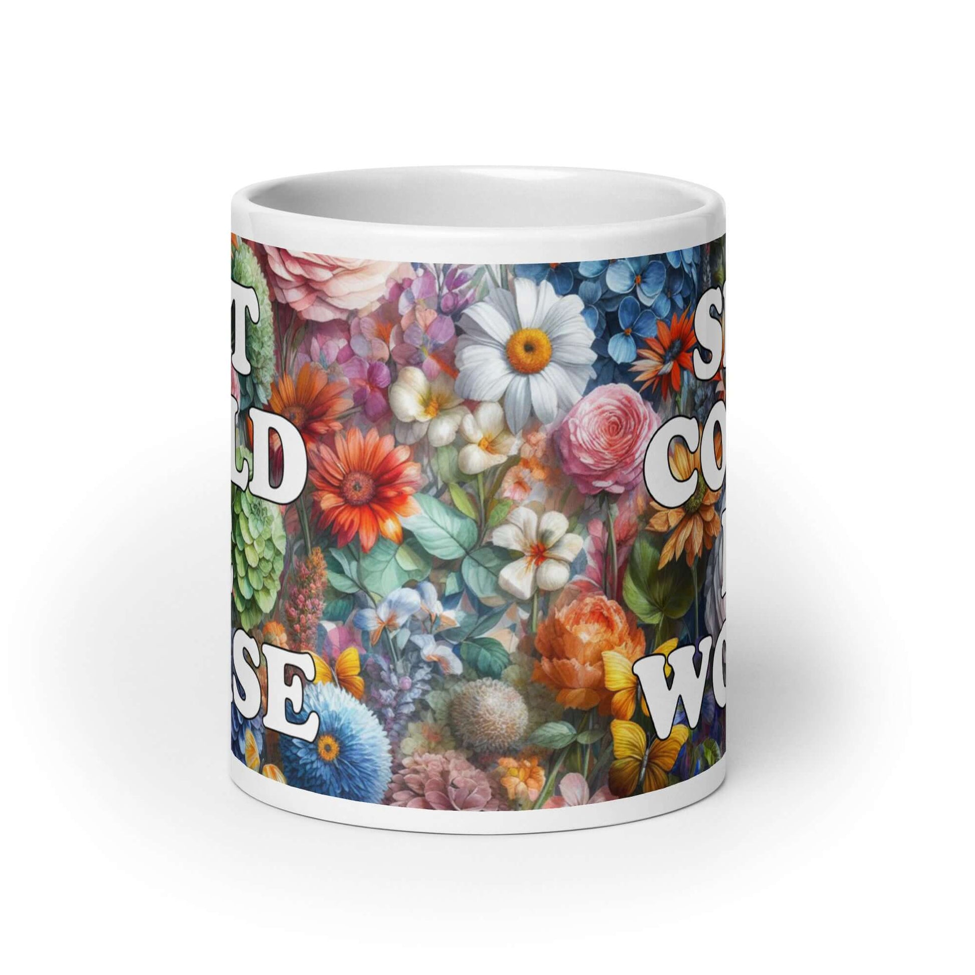 White ceramic mug floral background and the words "Shit could be worse" printed on both sides. 
