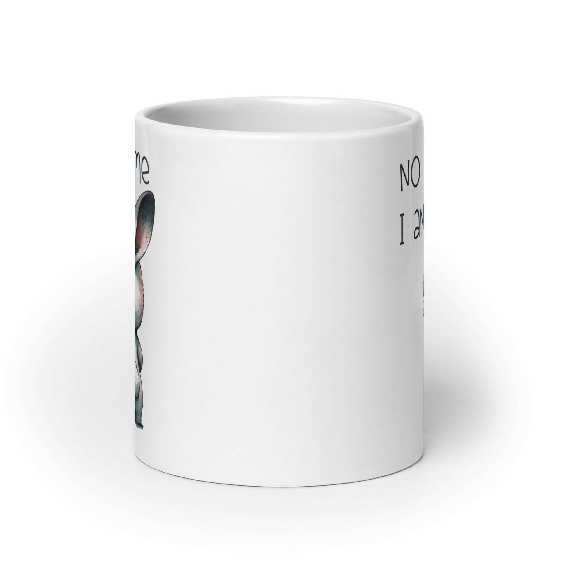 20 oz ceramic coffee mug with an image of an angry bunny with the phrase No talk me I angy printed on both sides of the mug.