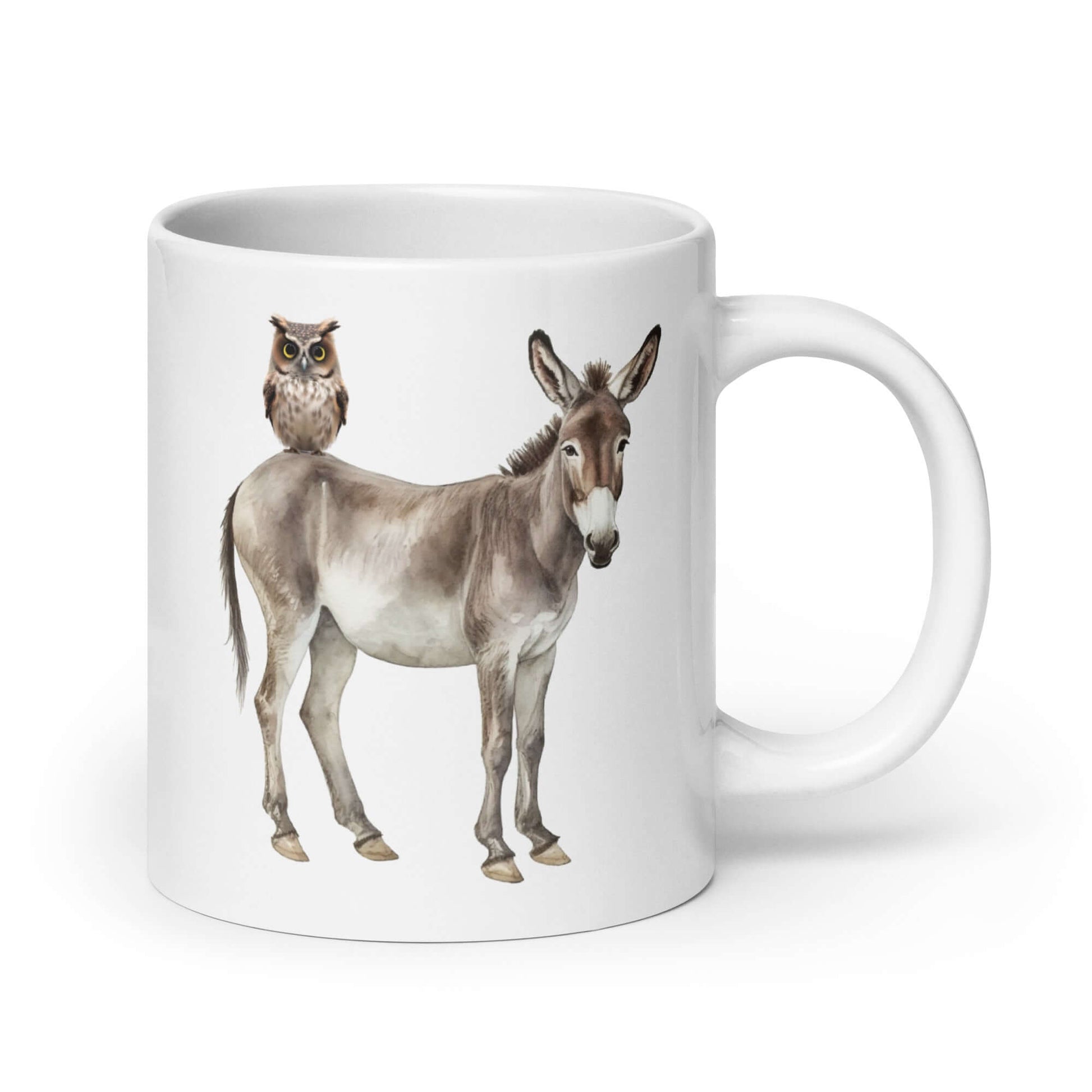 White ceramic coffee mug with an image of a donkey with wise owl sitting on it printed on both sides of the mug.