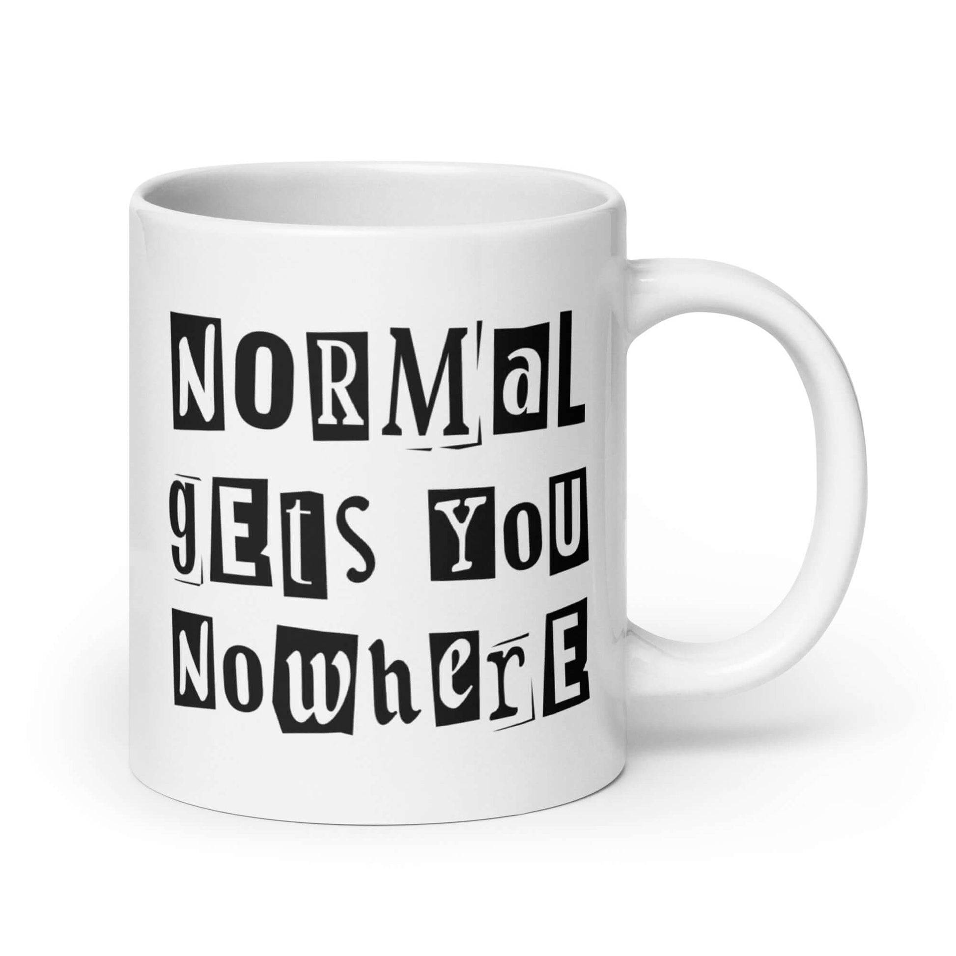 20 ounce white ceramic coffee mug with the phrase Normal gets you nowhere printed on both sides.