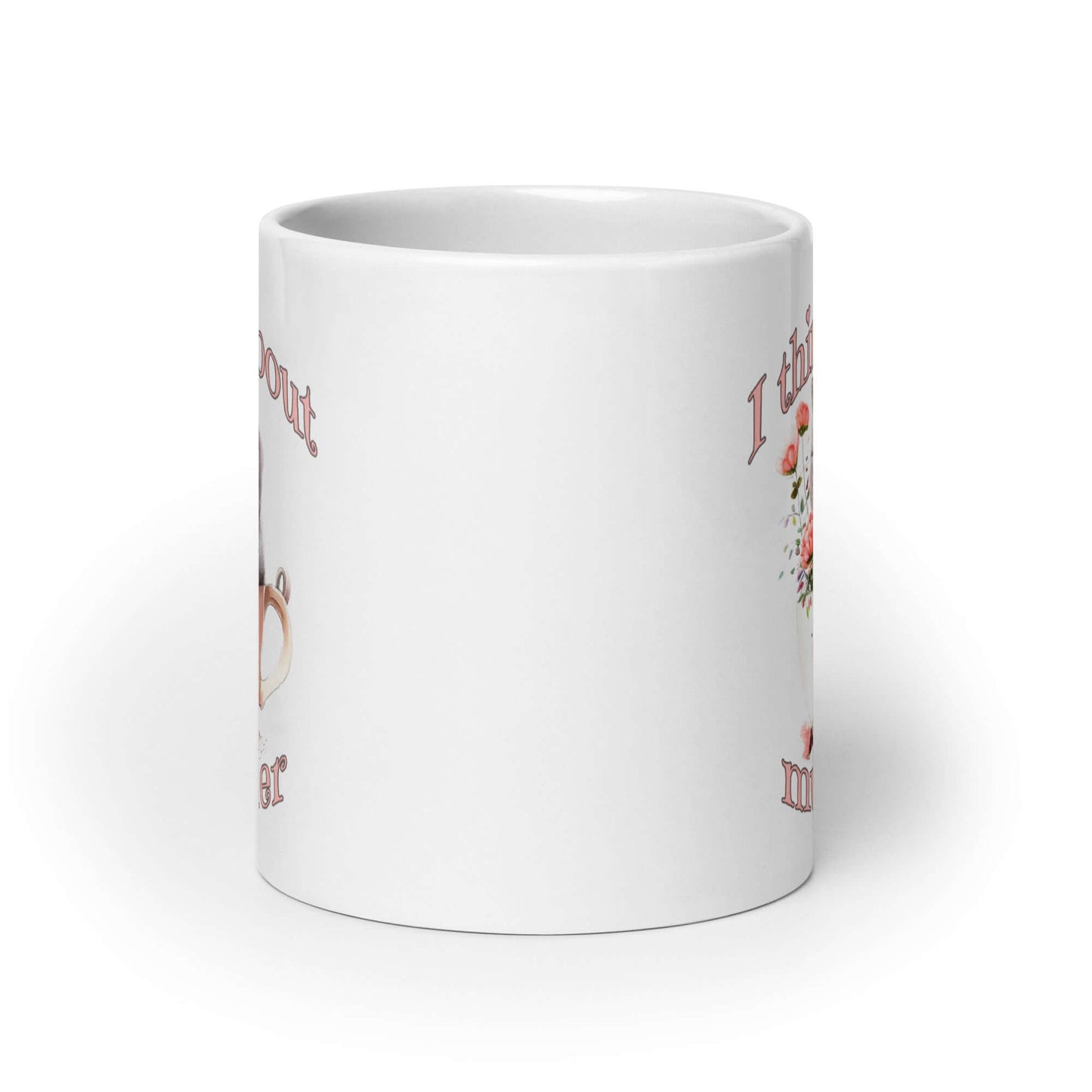 White ceramic mug that says I think about murder with image of cute fluffy kitten sitting in a teacup printed on both sides.