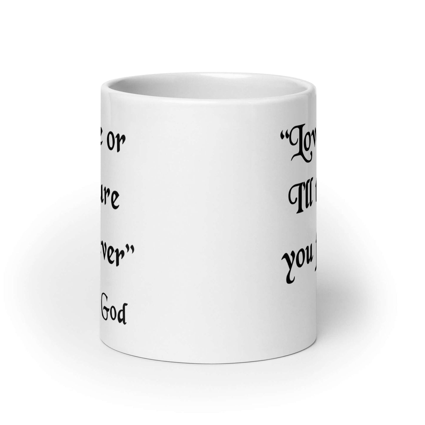 White ceramic mug with the quote Love me or I'll torture you forever-God printed on the front.