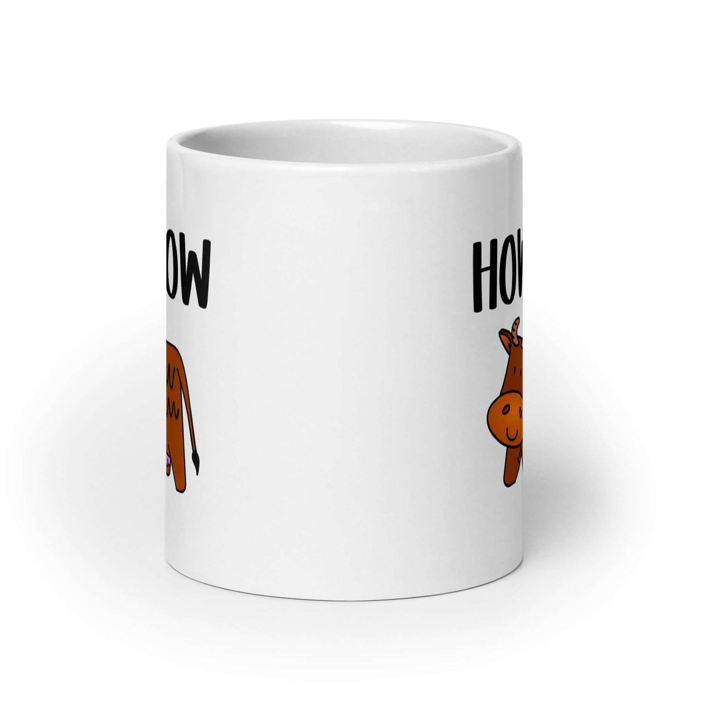 White ceramic mug with the words How now and an image of a brown cow printed on both sides.